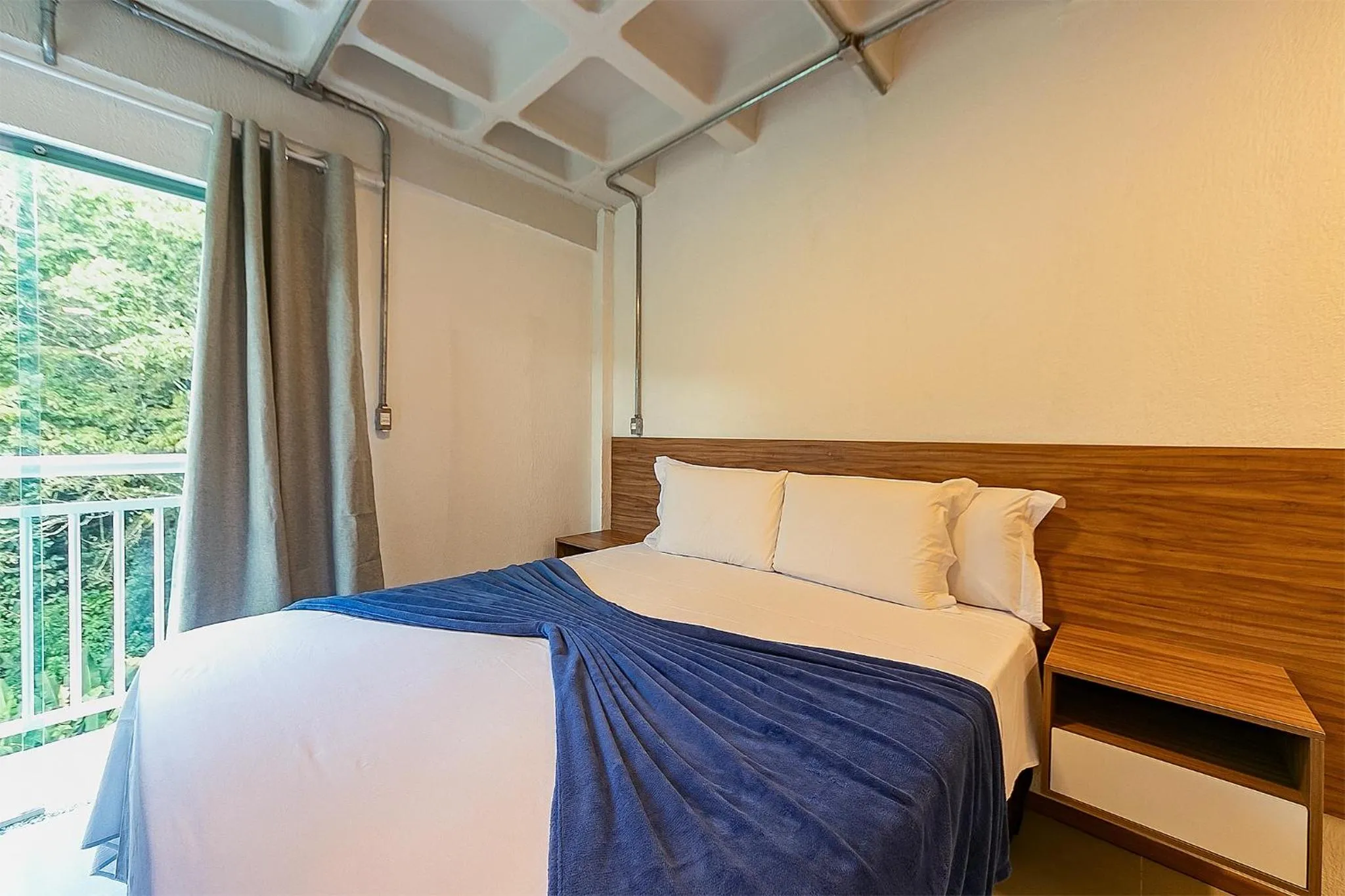 Bed in Antiquus ApartHotel