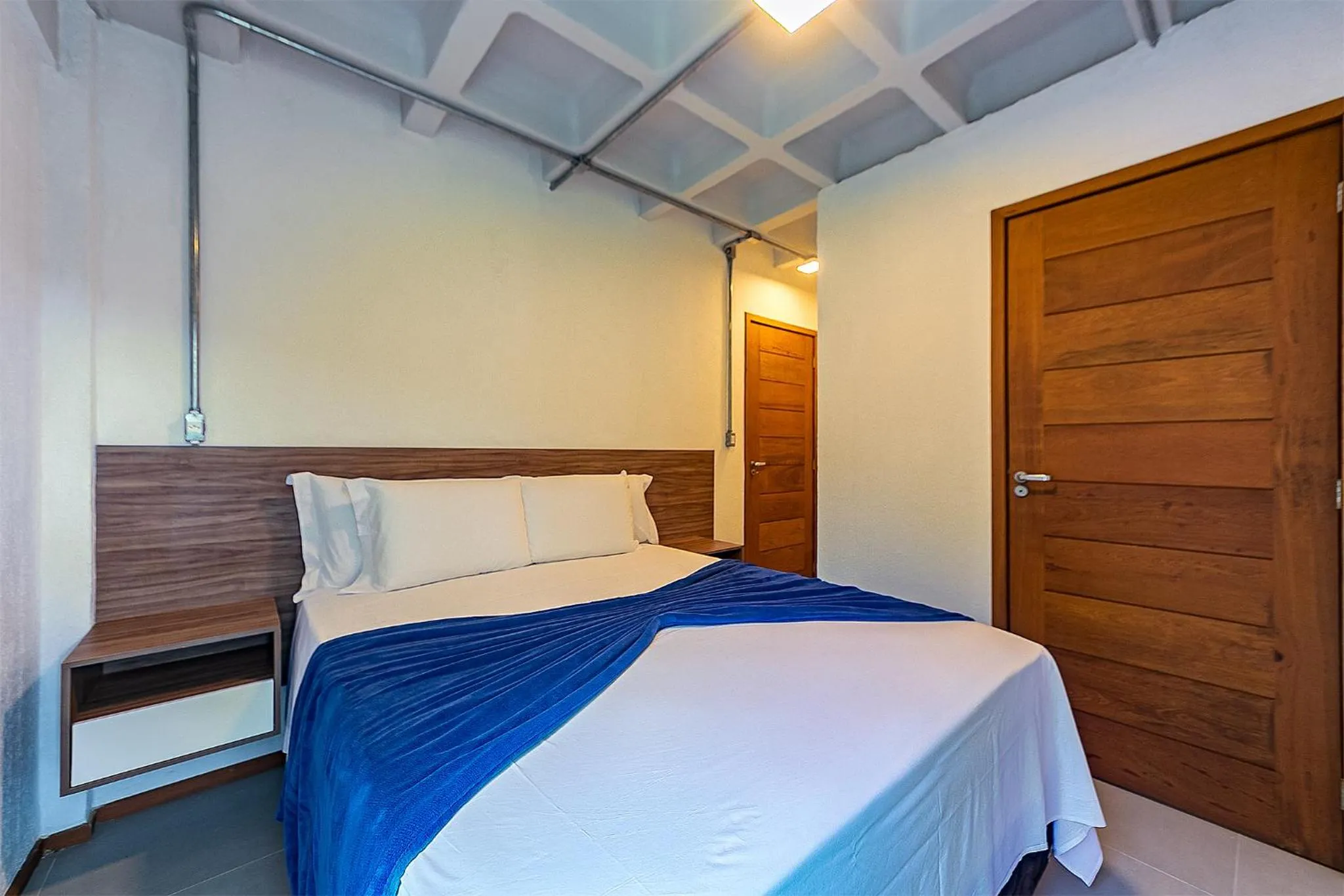 Bed in Antiquus ApartHotel