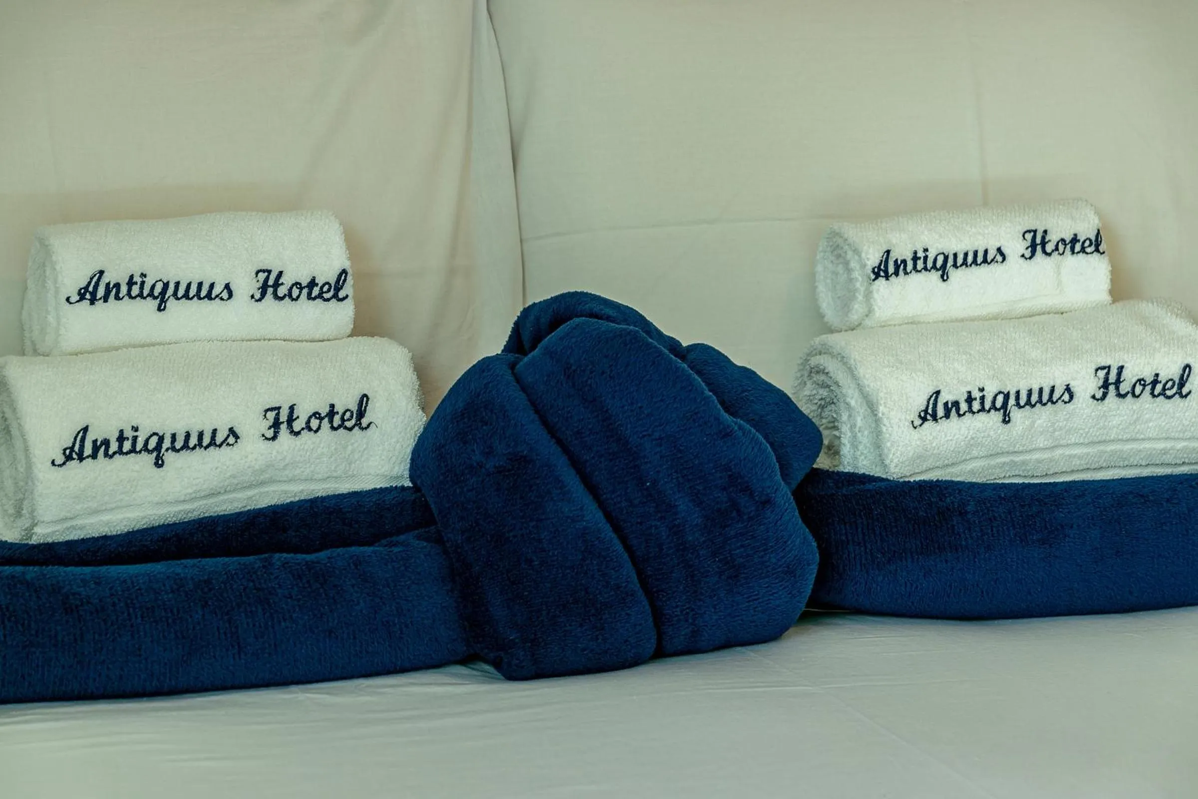 Bed in Antiquus ApartHotel