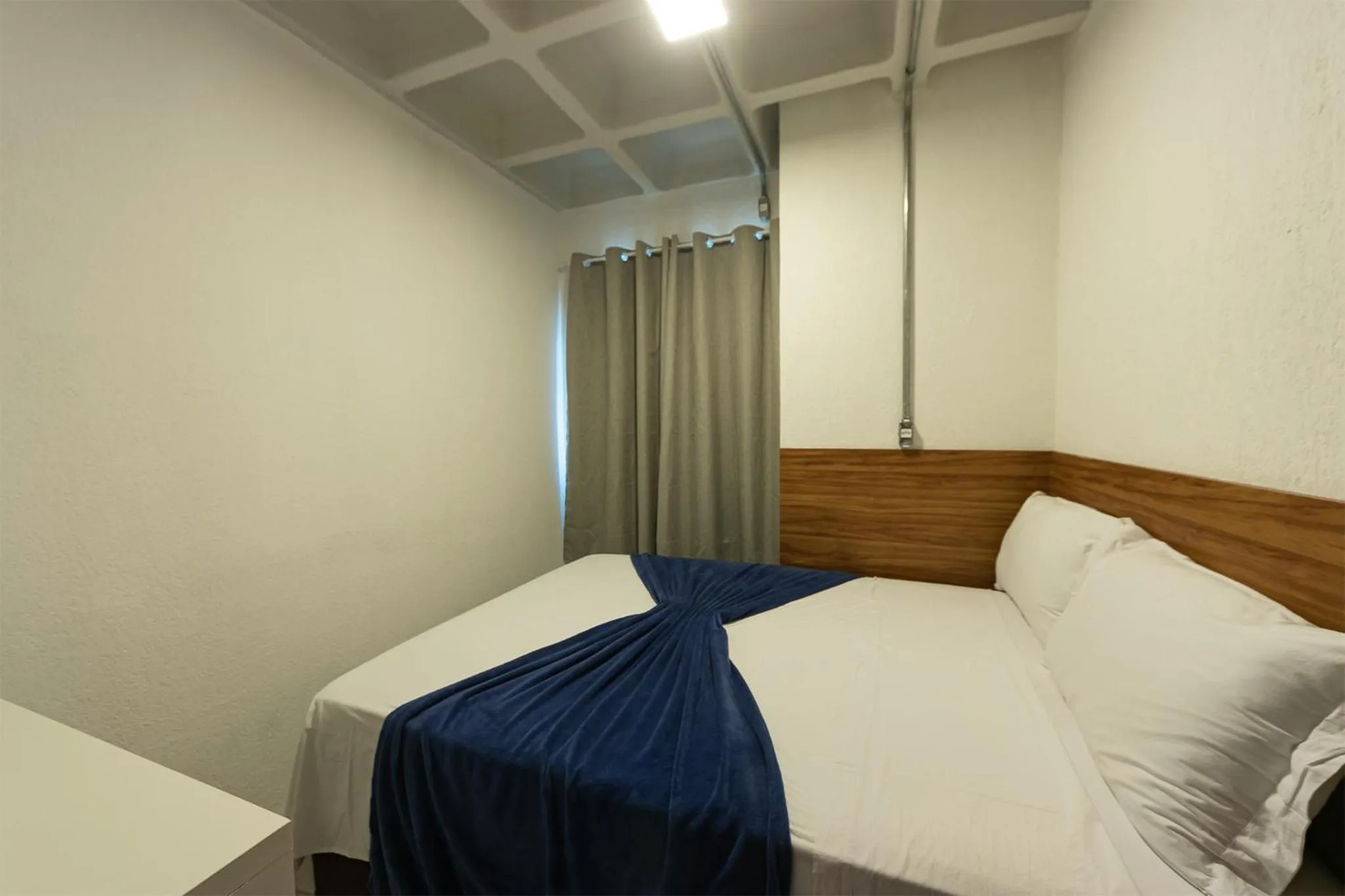 Bed in Antiquus ApartHotel