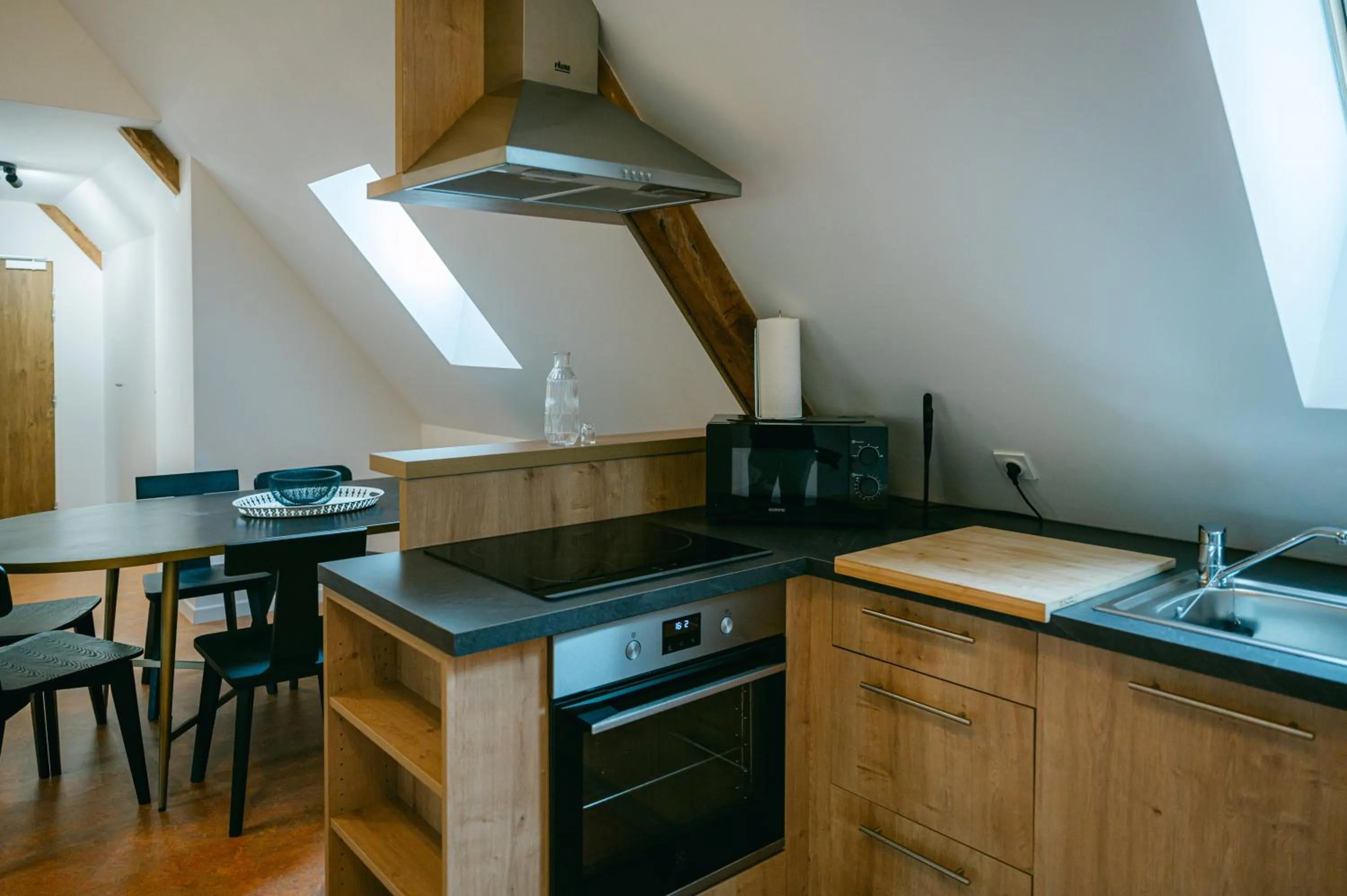 kitchen in Logis hôtel restaurant l'Argence