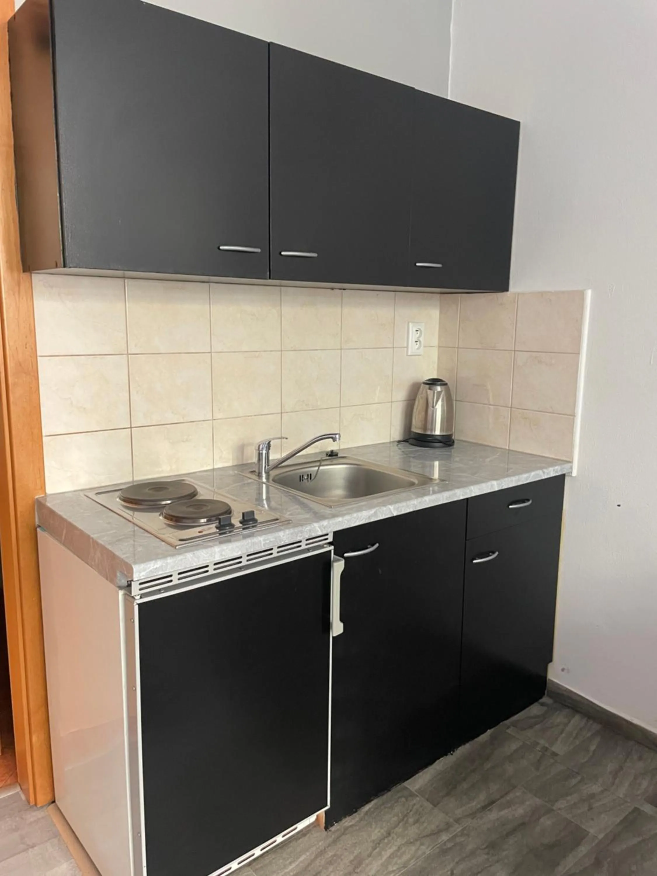 kitchen in Tiffany Apartment in the City Center