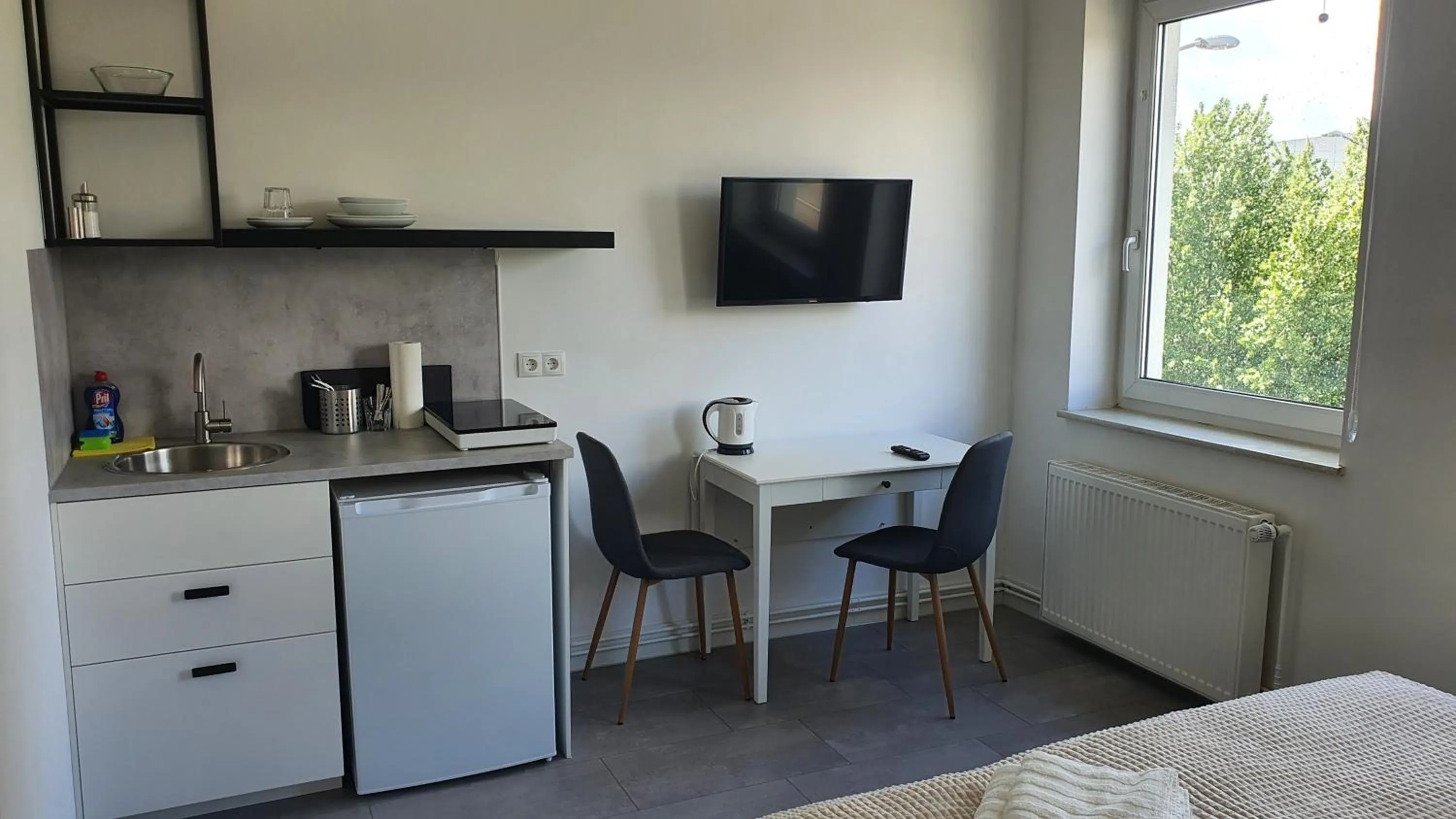 Kitchen or kitchenette in Davin City Aparments - Self-Check-In