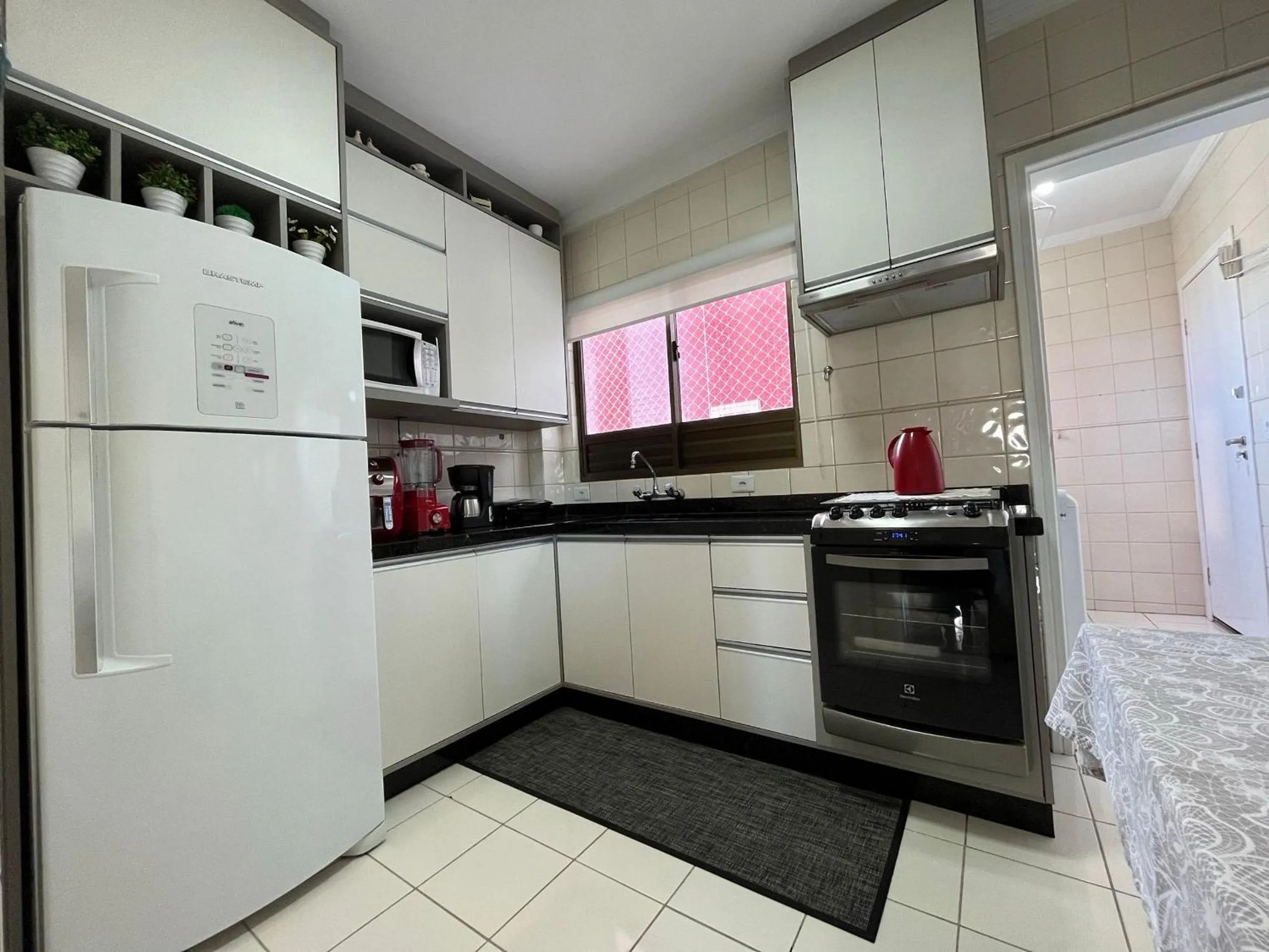Kitchen or kitchenette in CT01- Vista mar| Telas Proteção| Churrasq, Garagem