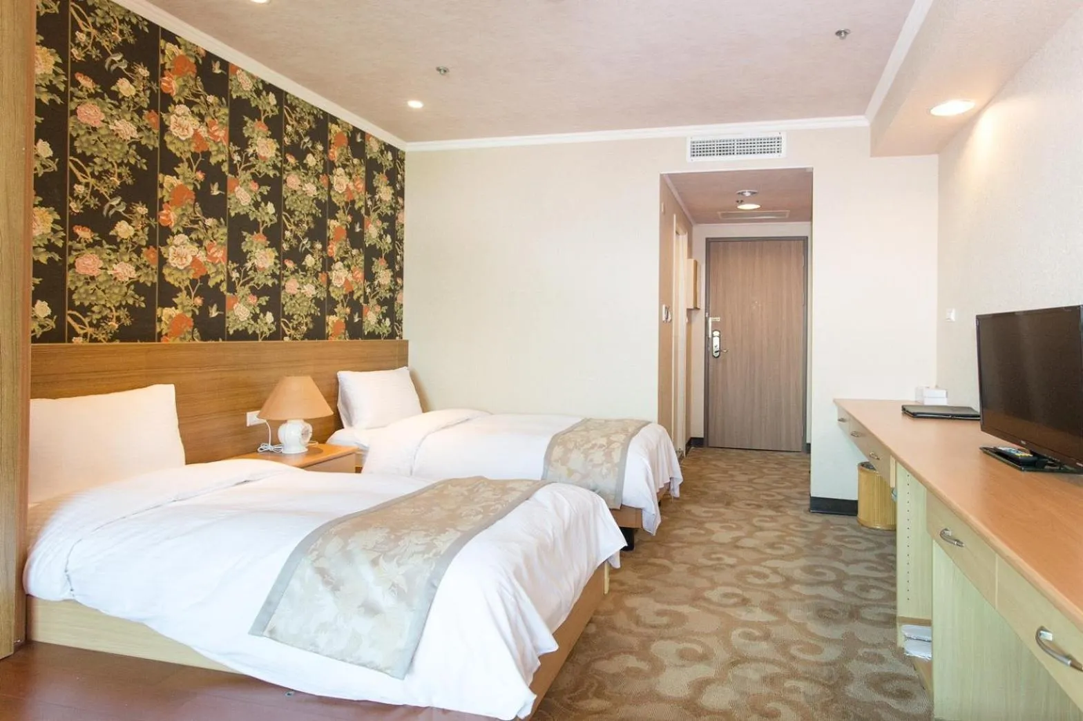 Bed in APVC Lukang Resort