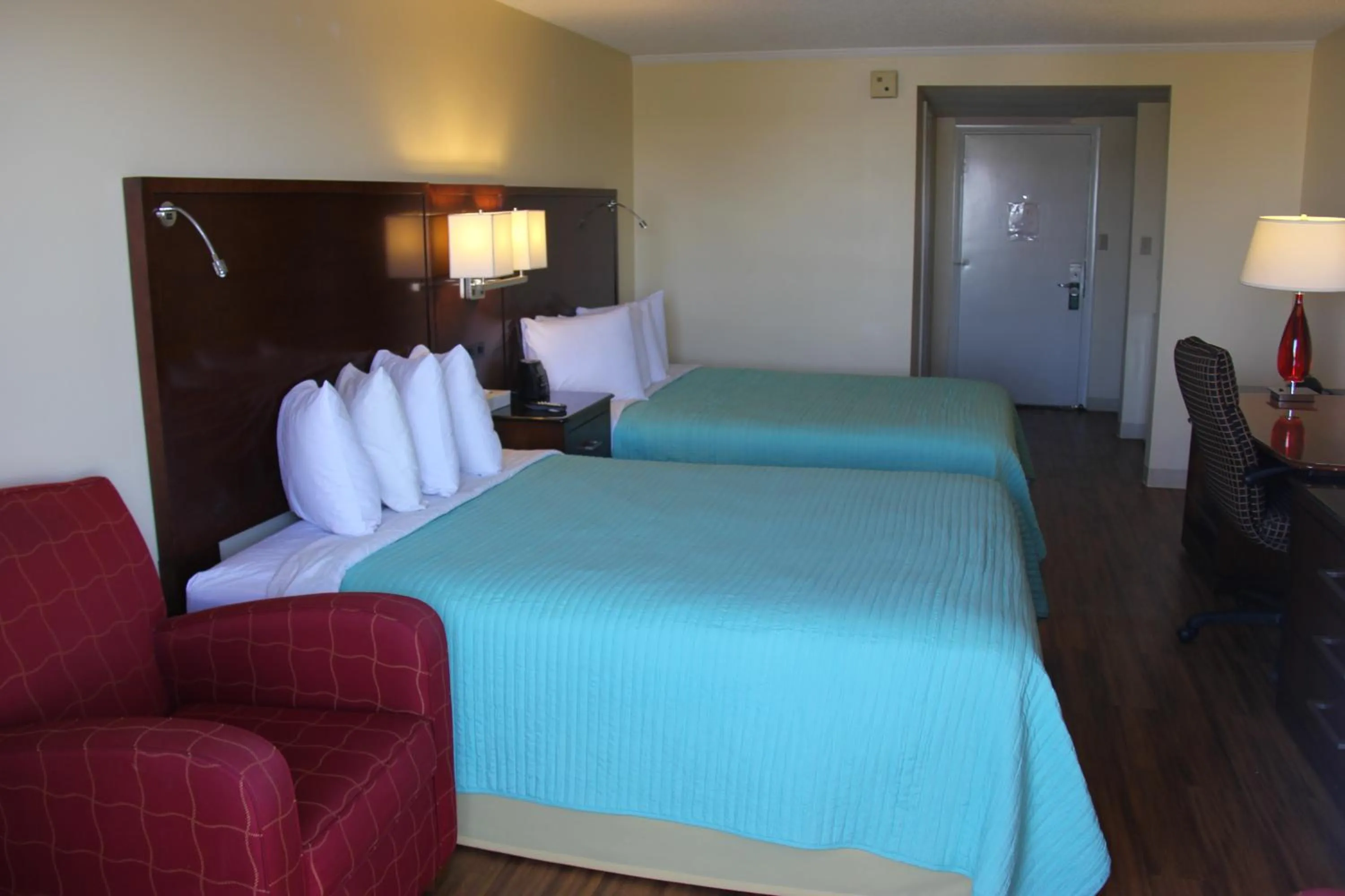 Queen Room with Two Queen Beds and Balcony in Seaside Inn & Suites