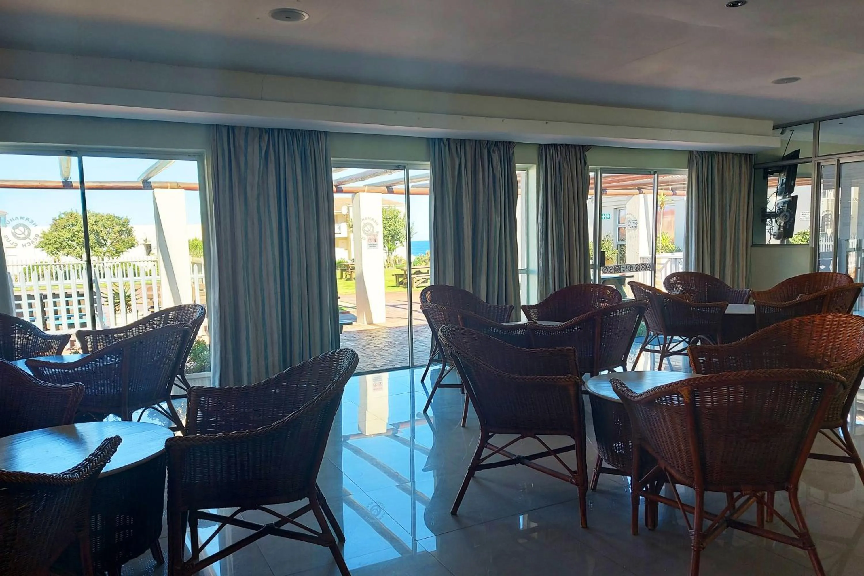 Lounge or bar in First Group Hermanus Beach Club