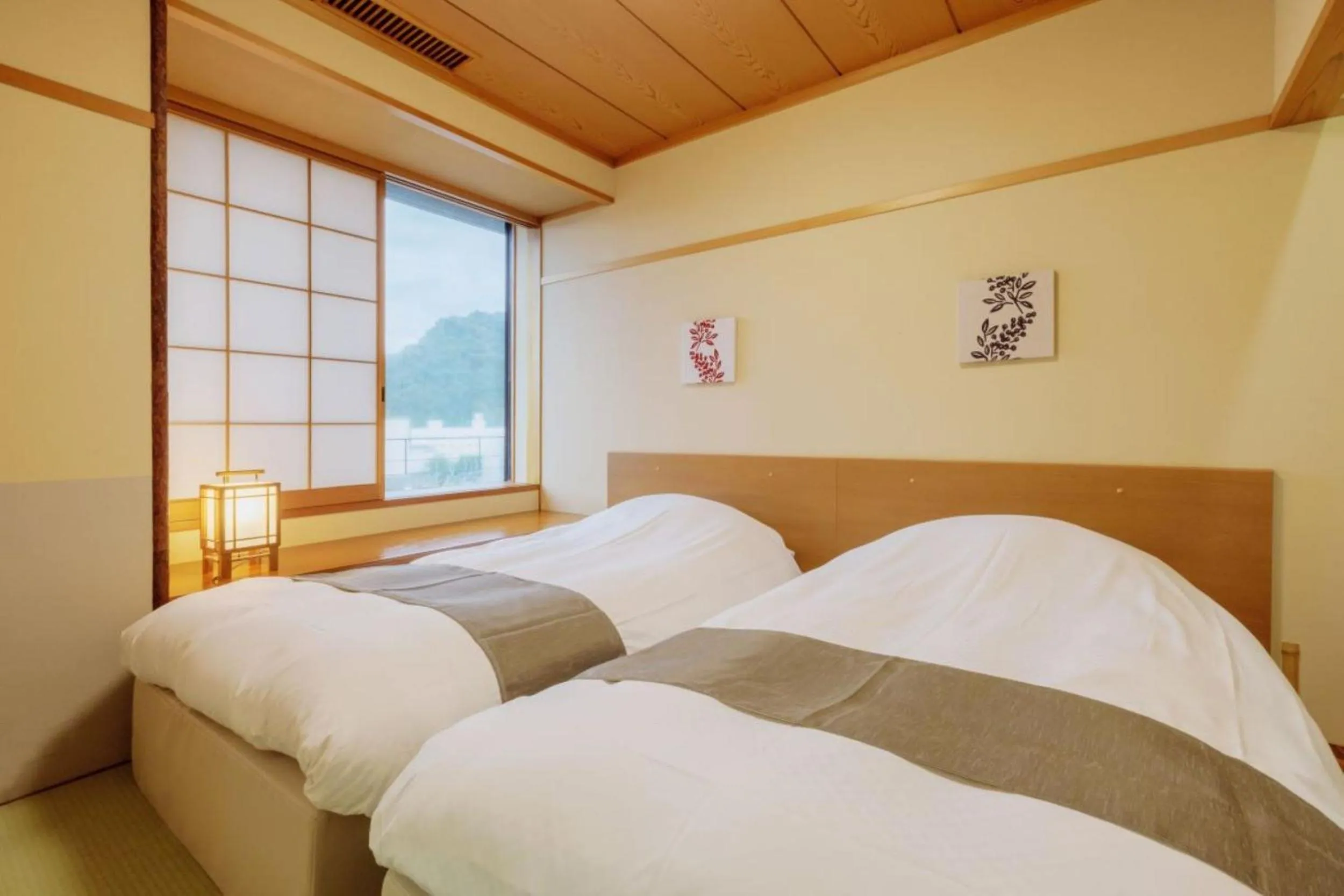 Bed in Takinoyu Hotel
