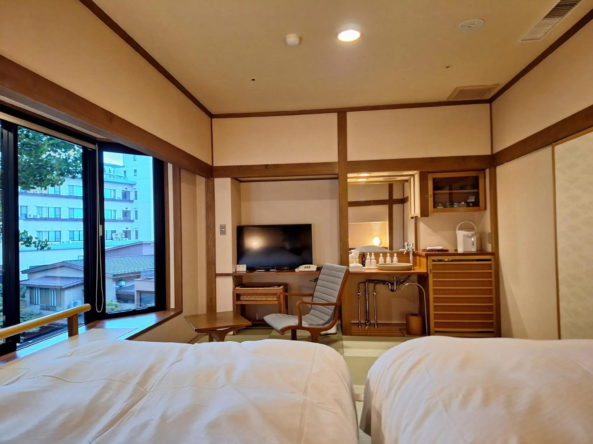 Bed in Takinoyu Hotel