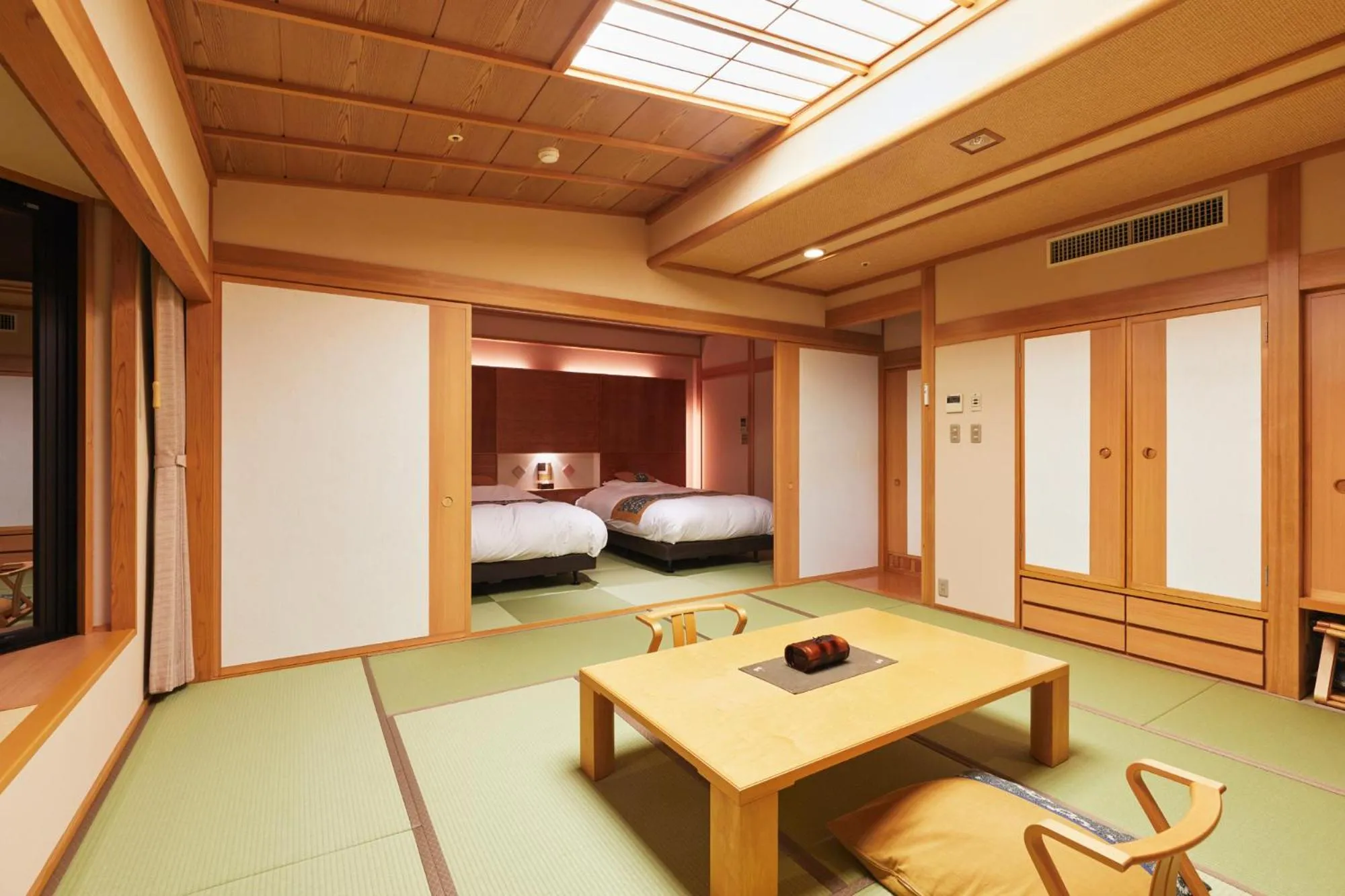 Bed in Takinoyu Hotel