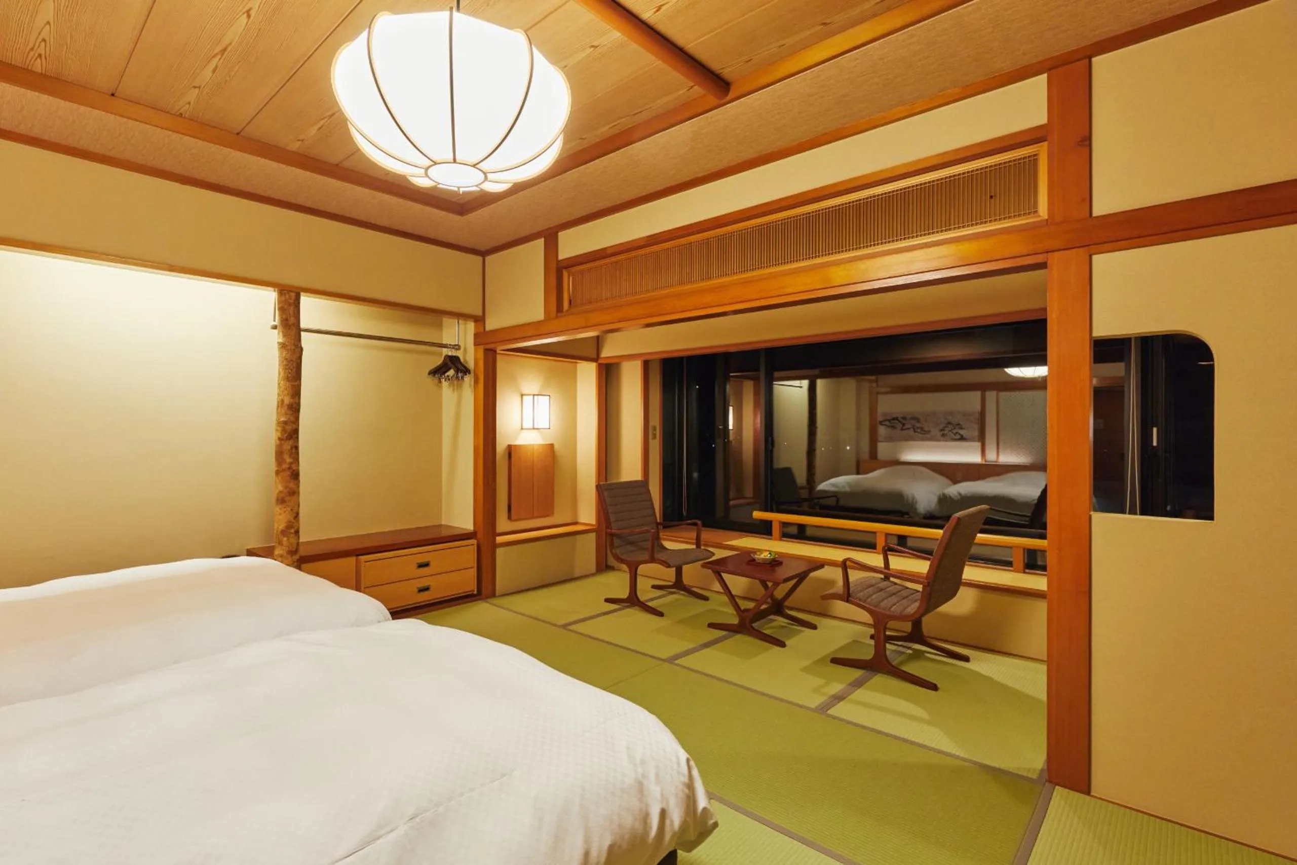 Bed in Takinoyu Hotel