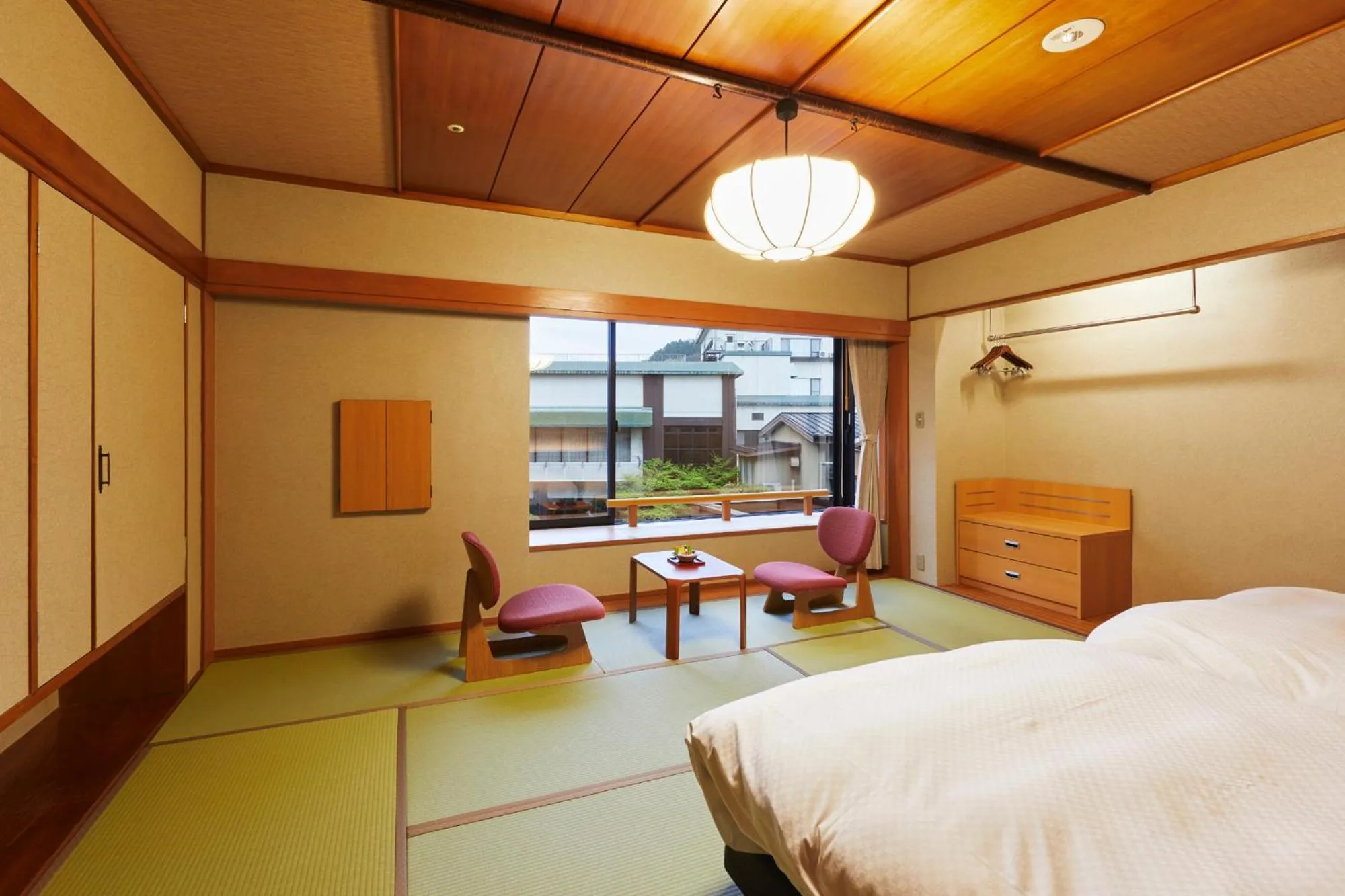 Bed in Takinoyu Hotel