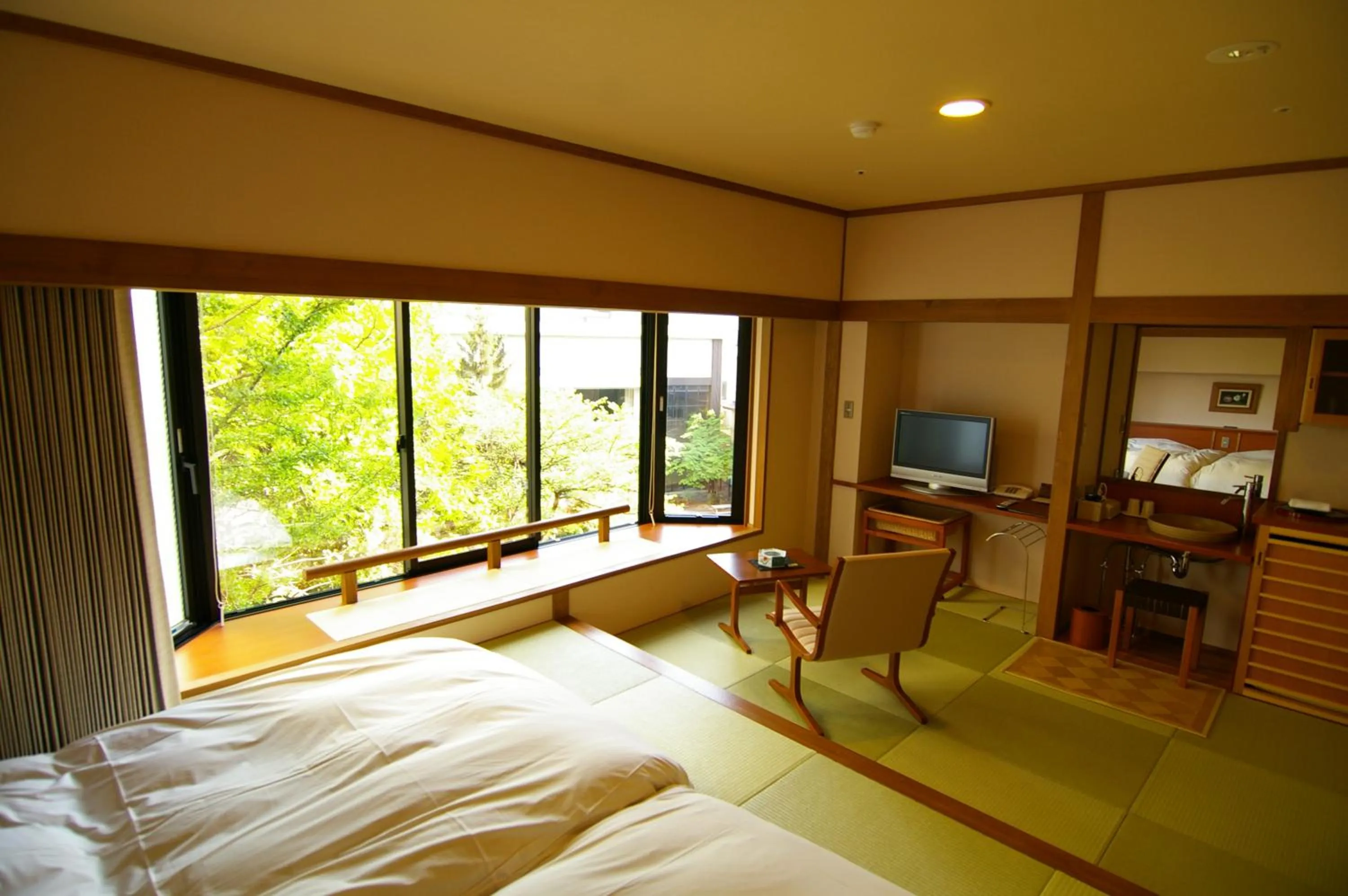 Bed in Takinoyu Hotel