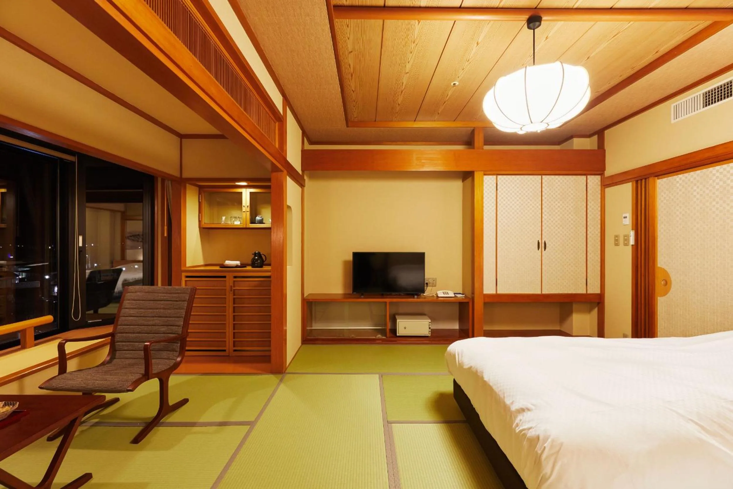 Bed in Takinoyu Hotel