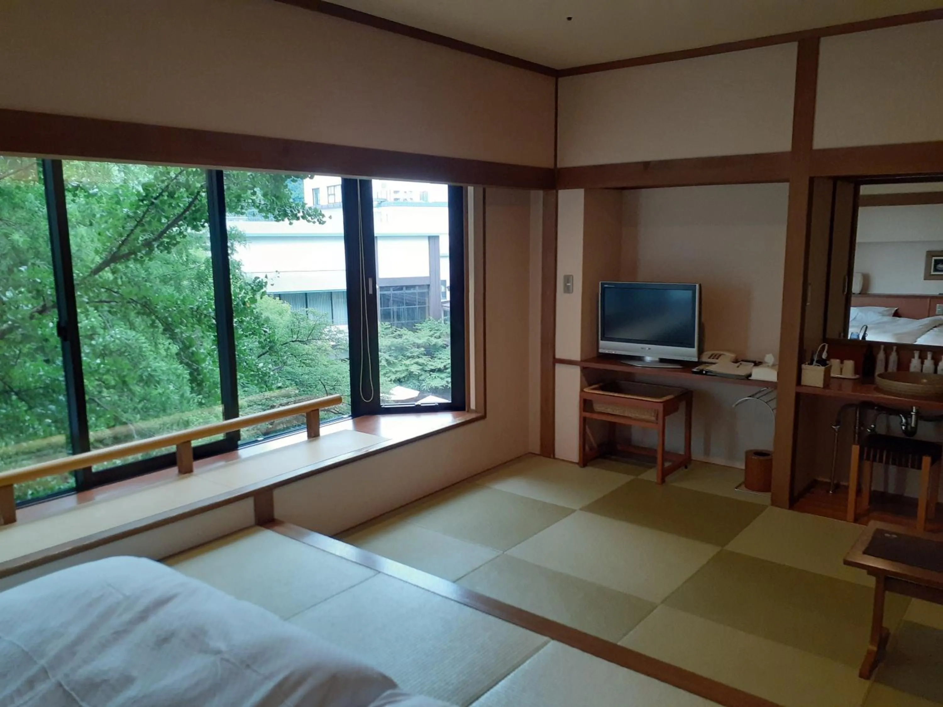 Bed in Takinoyu Hotel
