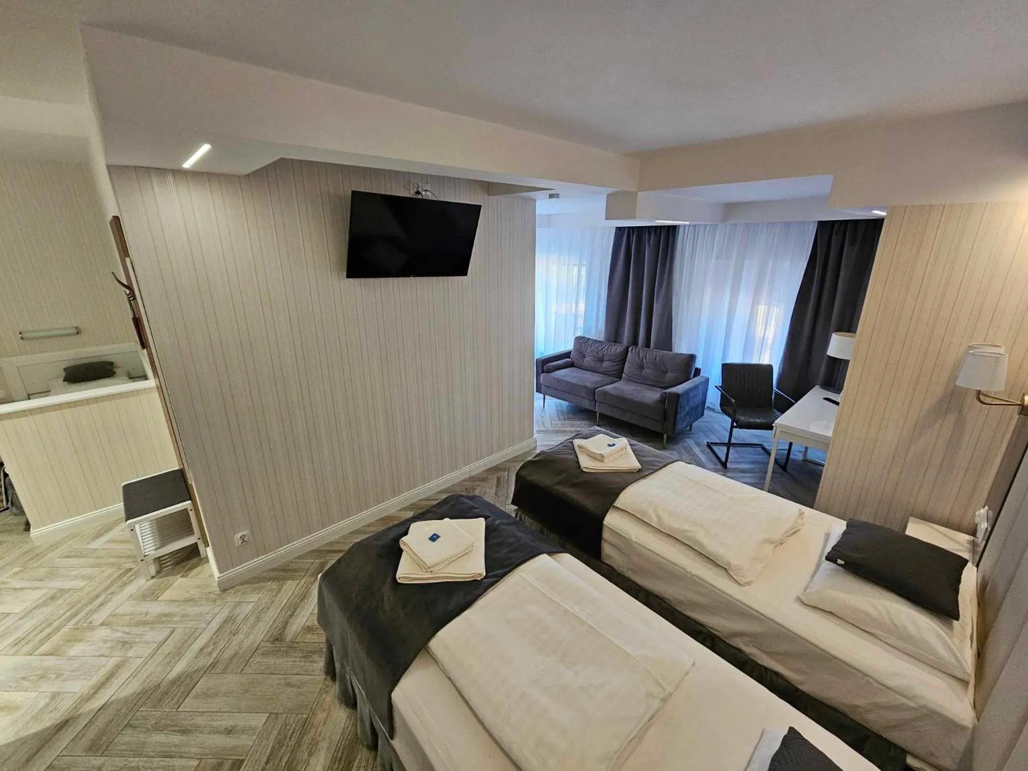 Communal lounge/ TV room, Bed in Apartamenty Hayduk