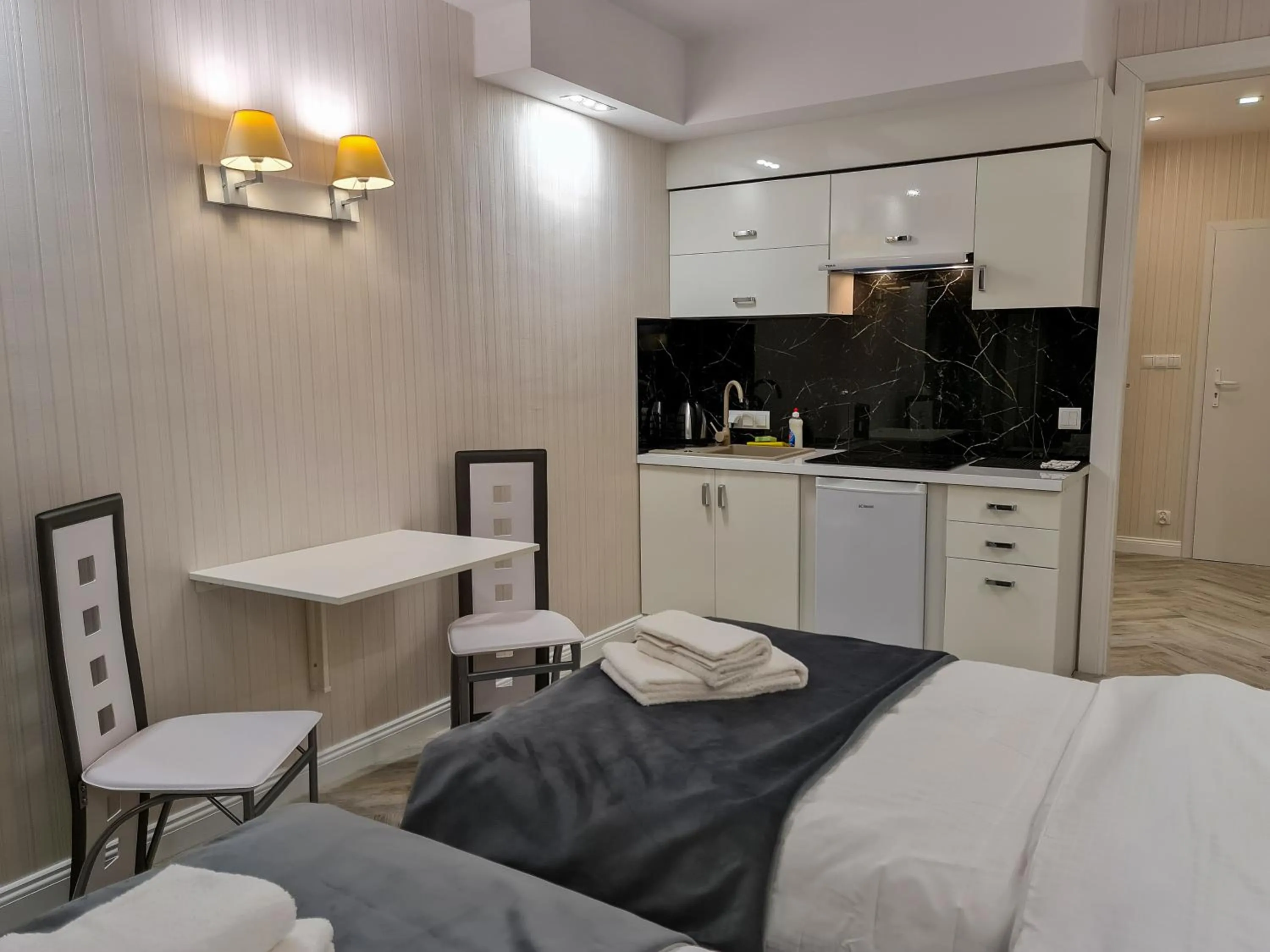Coffee/tea facilities, Bed in Apartamenty Hayduk