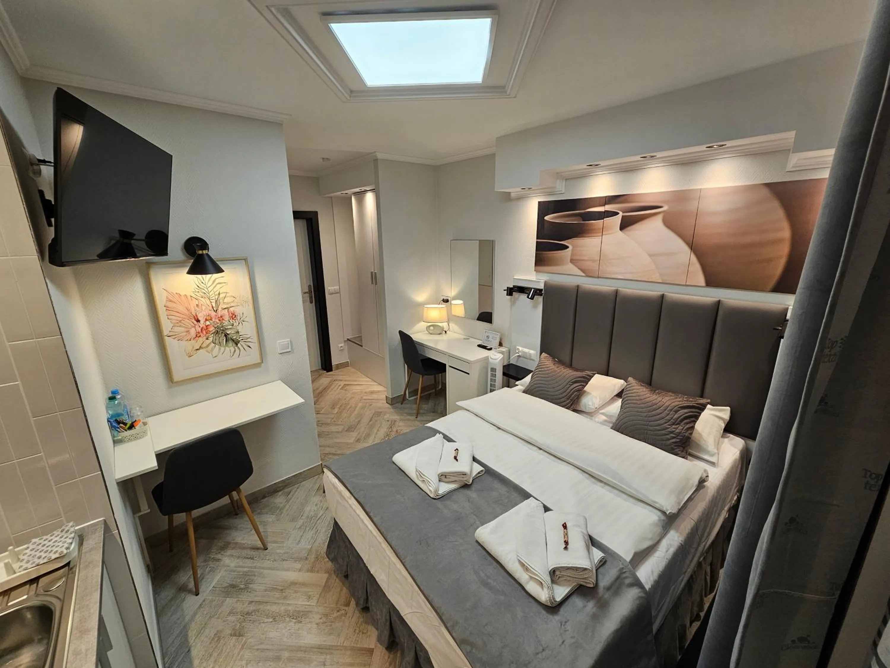 Communal lounge/ TV room, Bed in Apartamenty Hayduk