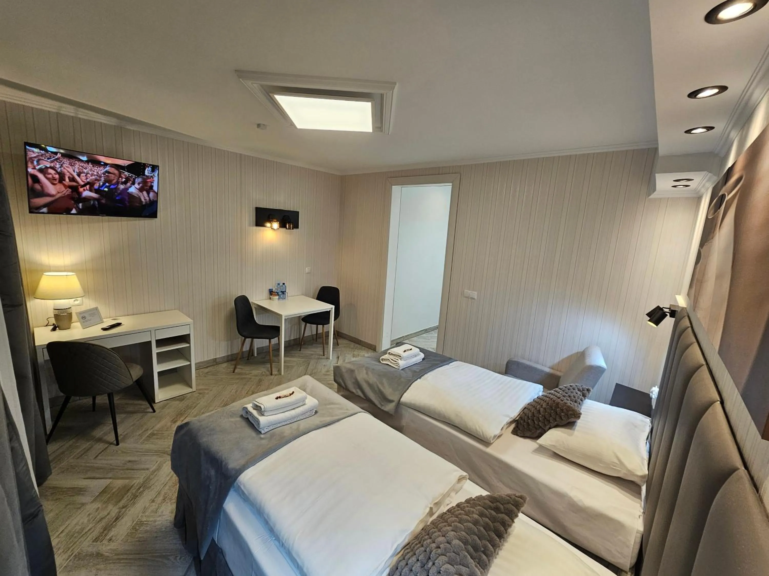 Communal lounge/ TV room, Bed in Apartamenty Hayduk