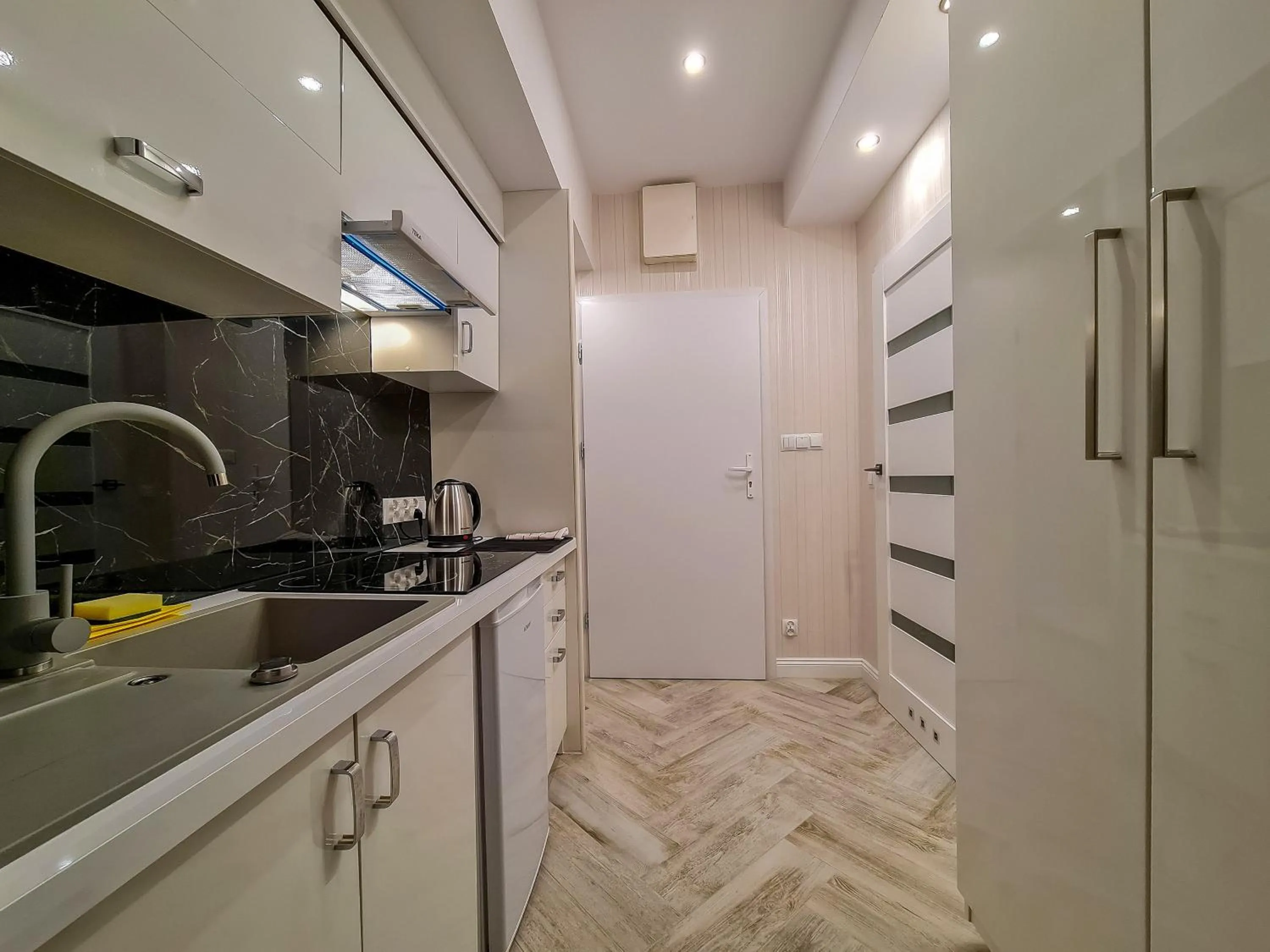 Kitchen or kitchenette in Apartamenty Hayduk