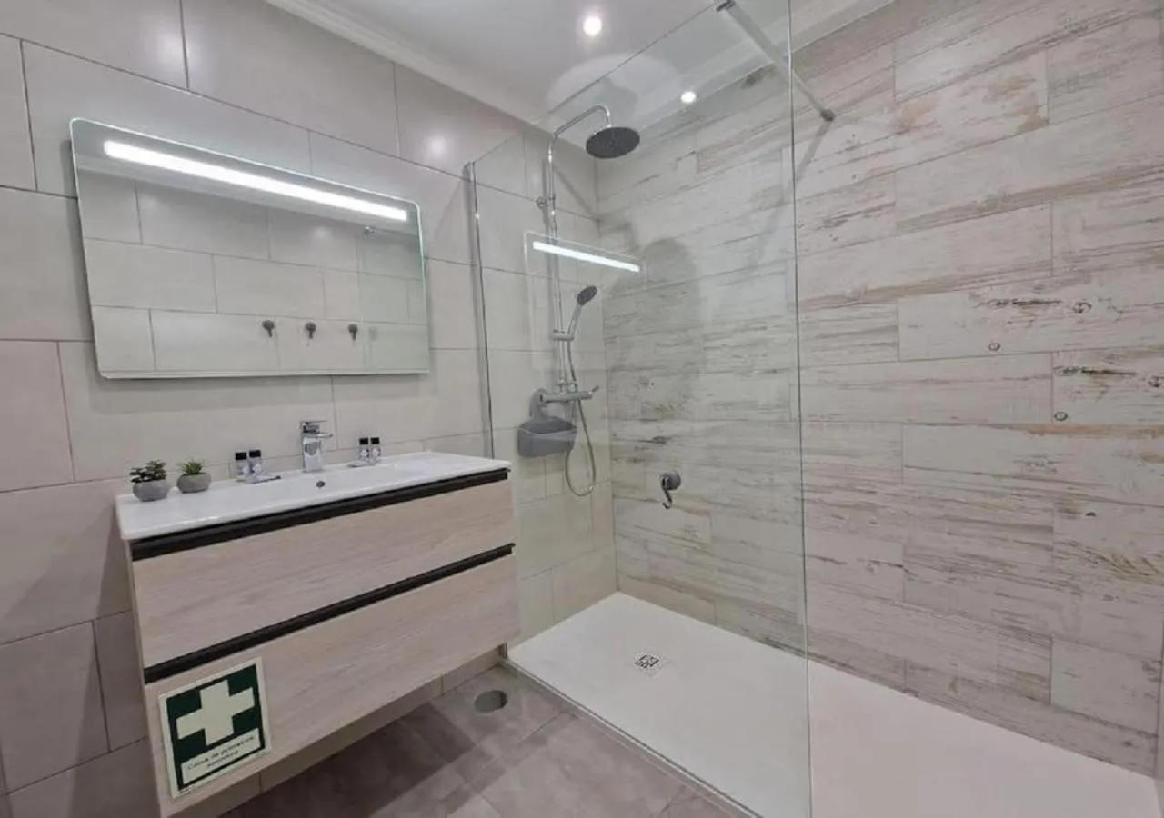 Shower in Modern flat with sea view and direct beach access