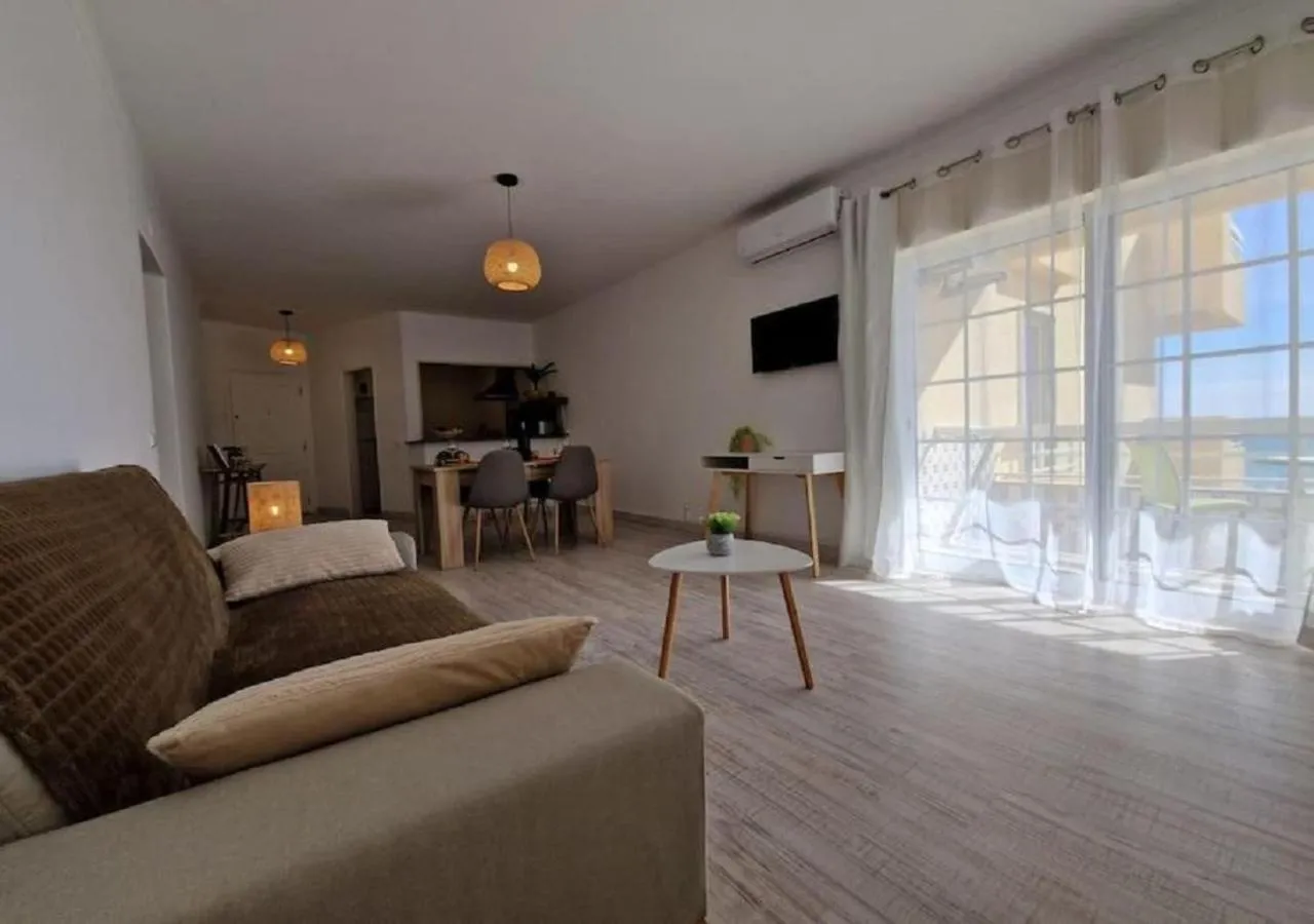 Living room in Modern flat with sea view and direct beach access