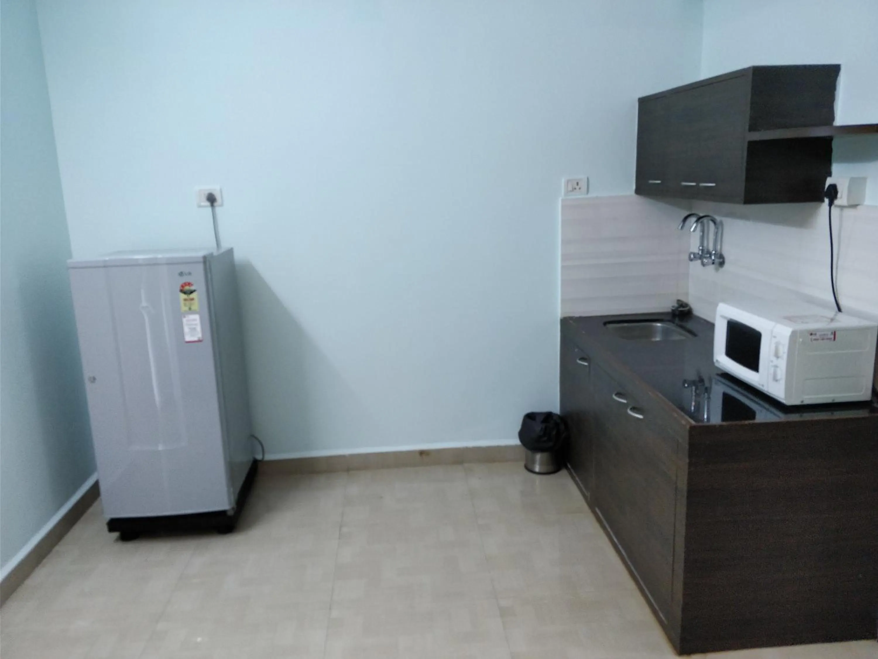 Kitchen or kitchenette in YoYo Goa, The Apartment Hotel