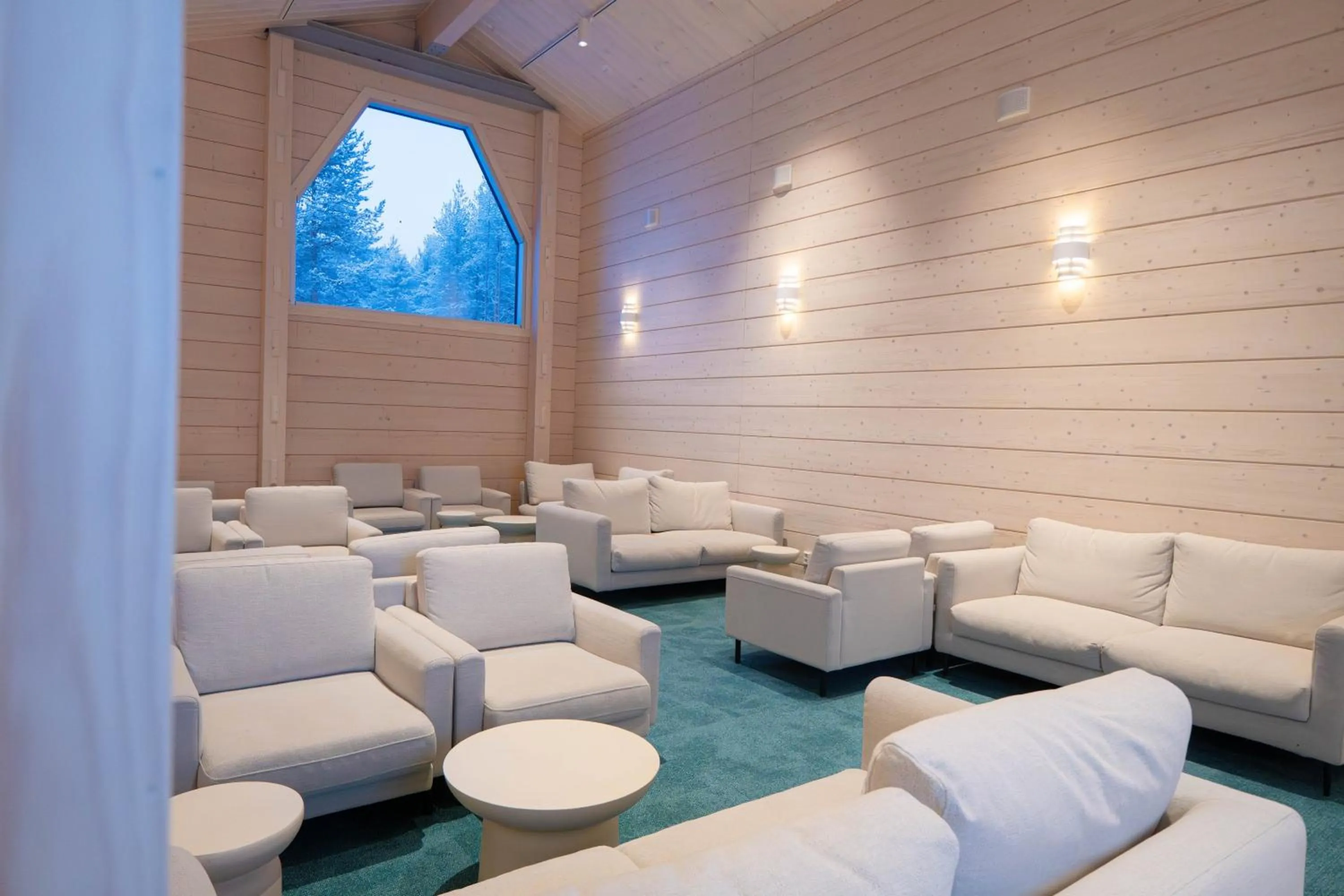 Communal lounge/ TV room in Arctic SnowHotel & Glass Igloos