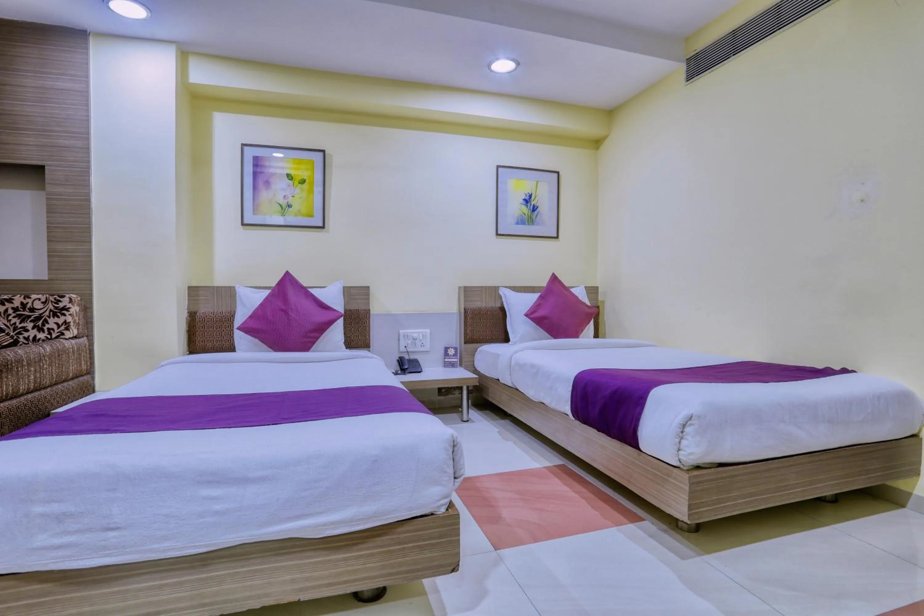 Bed in Hotel Amrit Residency