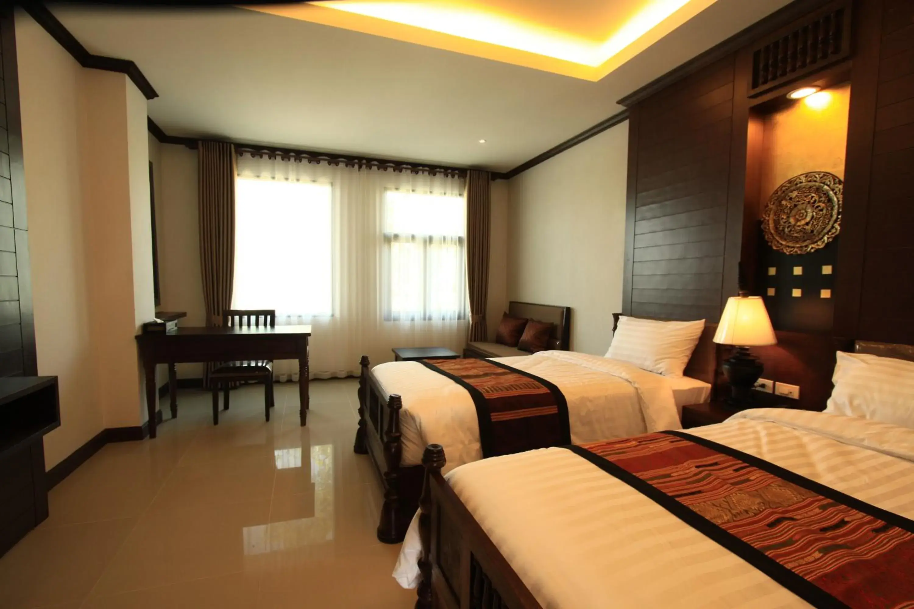 Bed in Baan Ratchiangsaen Bed in Baan Ratchiangsaen