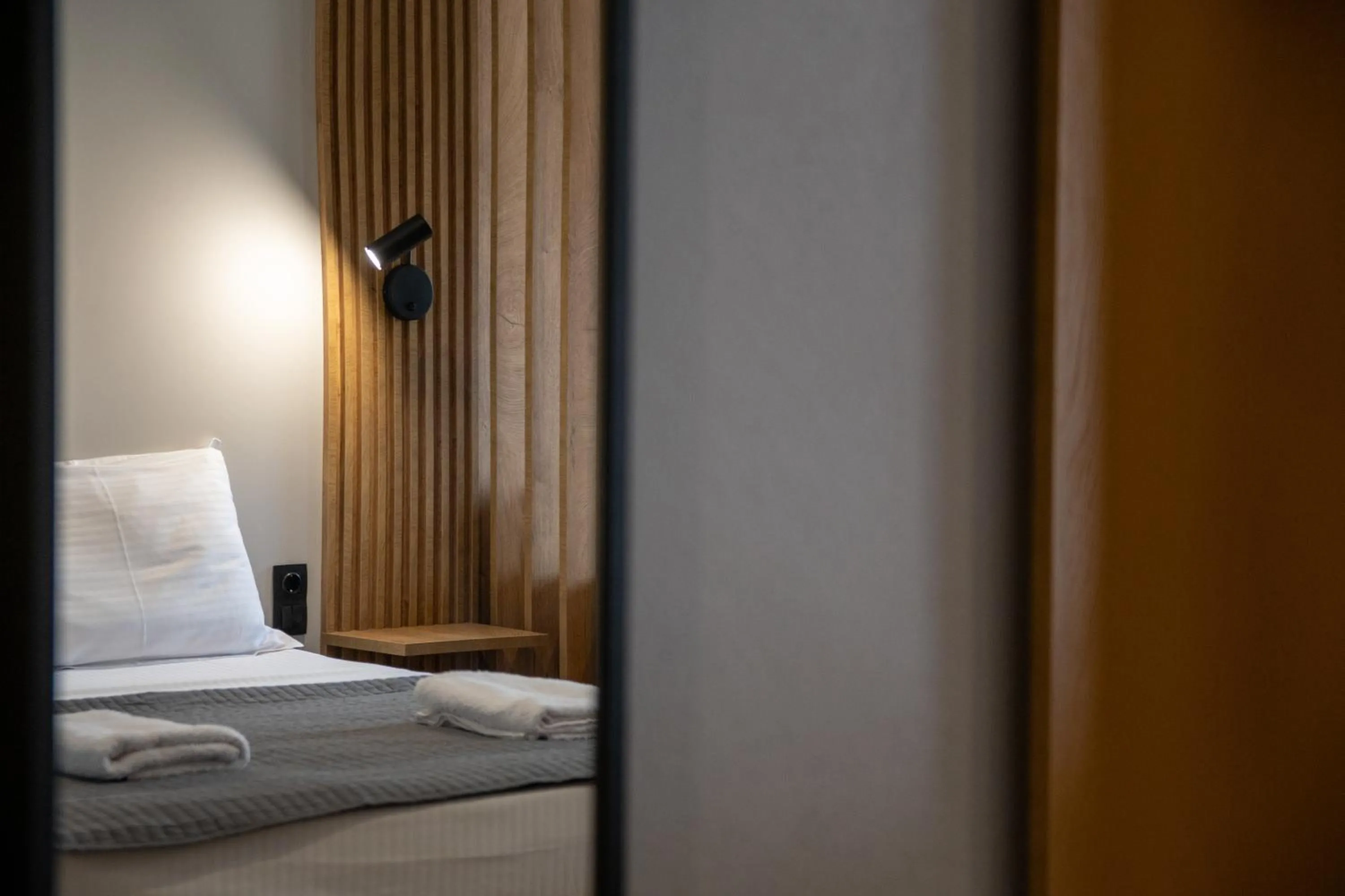Bed in Unique Aura Luxury Studios