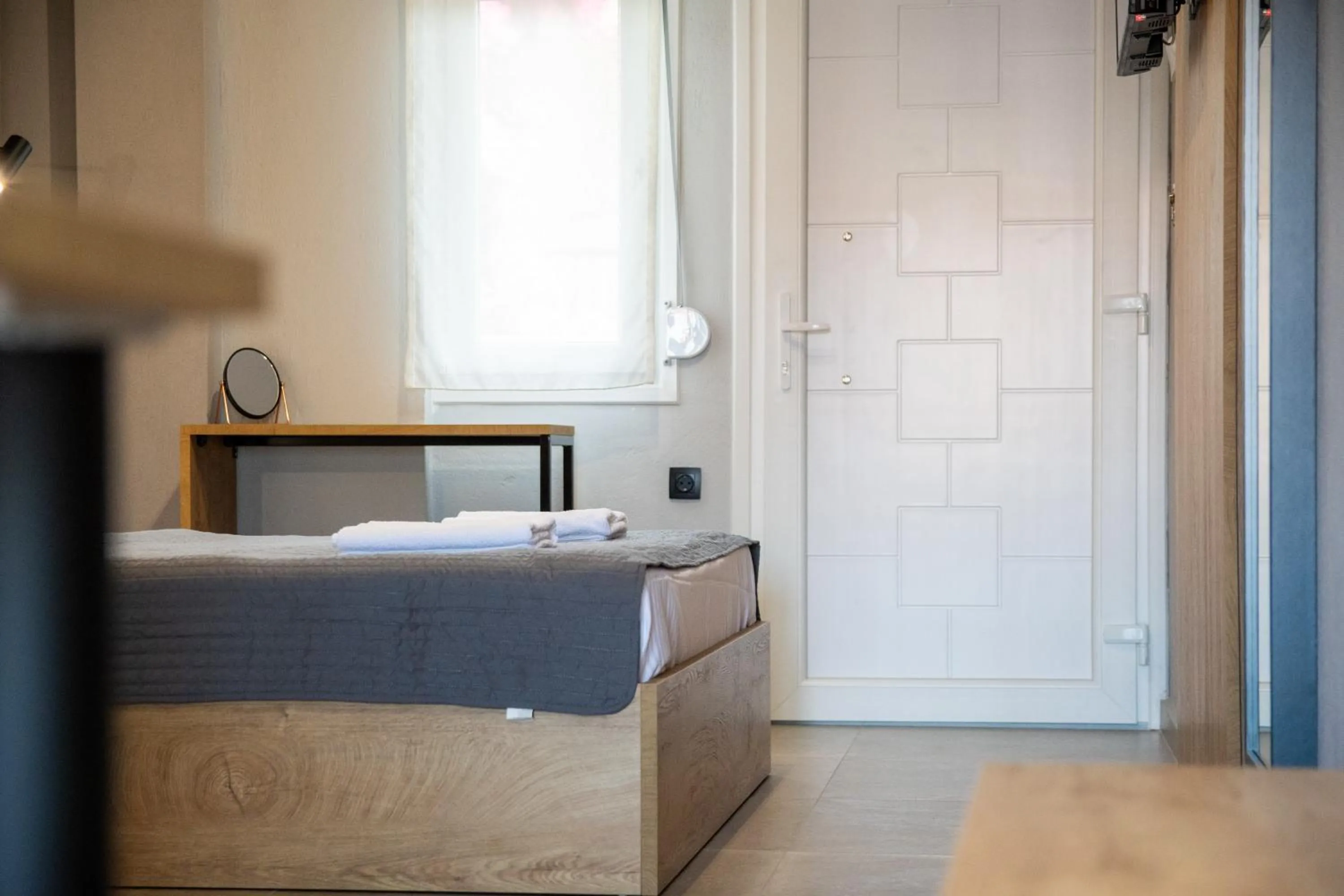 Bed in Unique Aura Luxury Studios