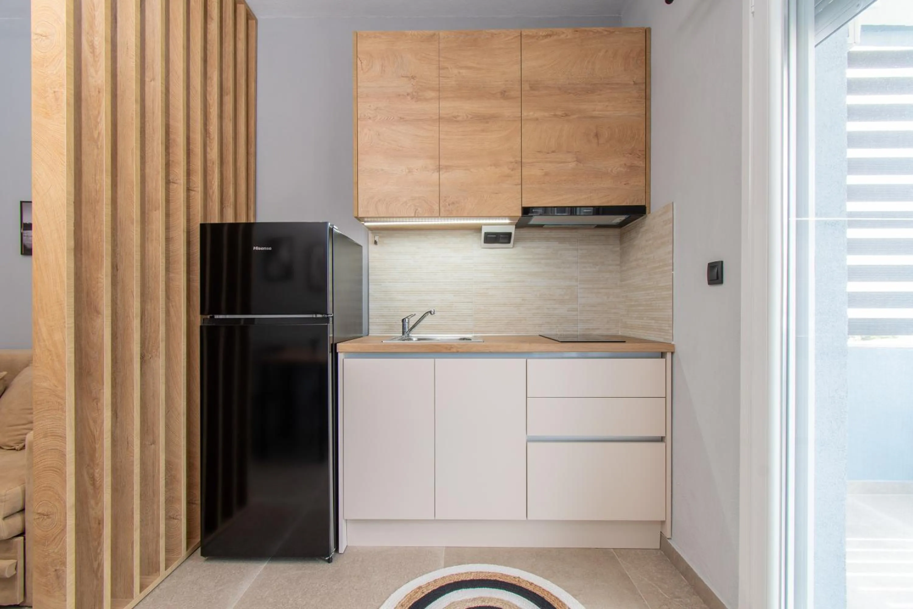 Kitchen or kitchenette in Unique Aura Luxury Studios