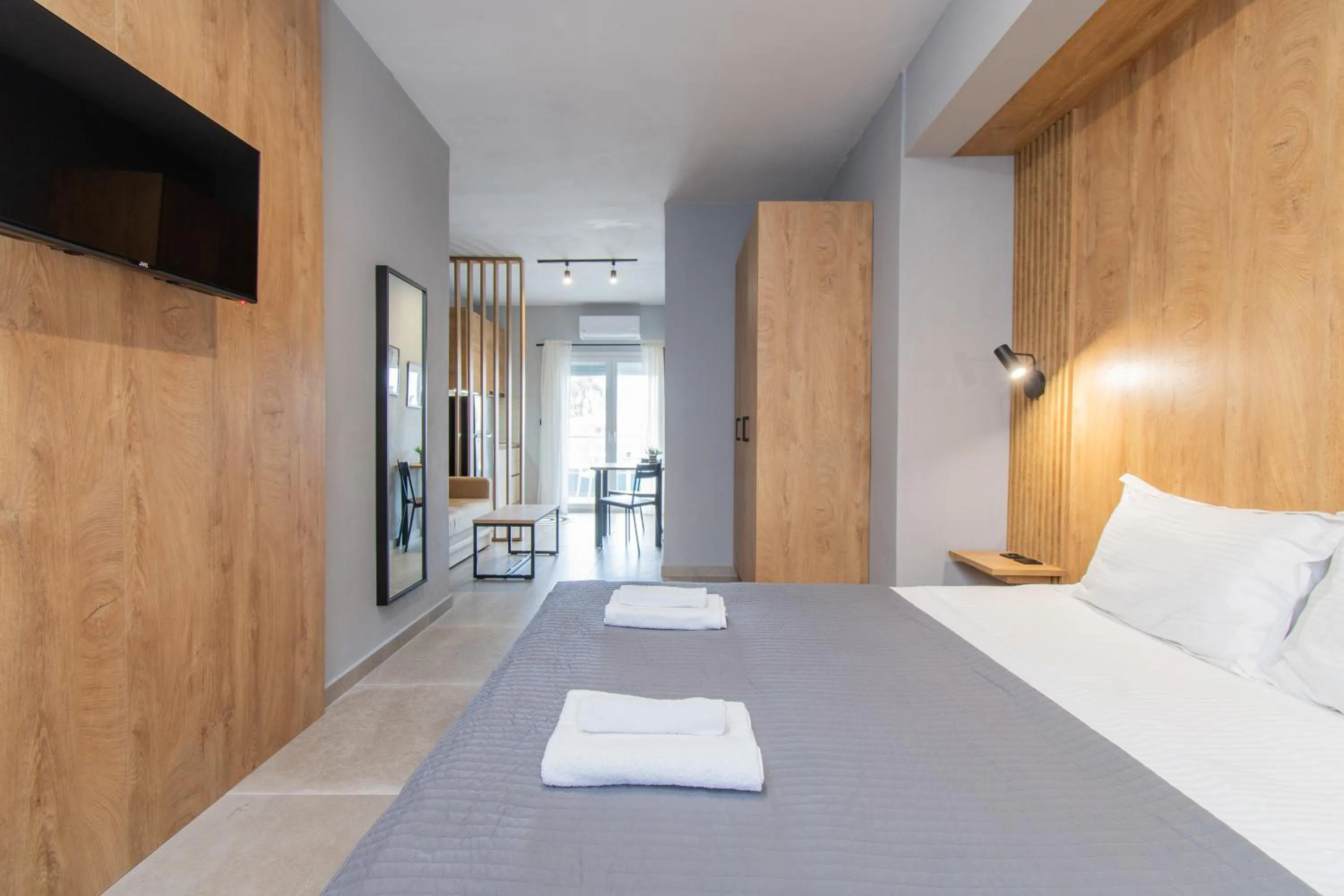 Photo of the whole room, Bed in Unique Aura Luxury Studios