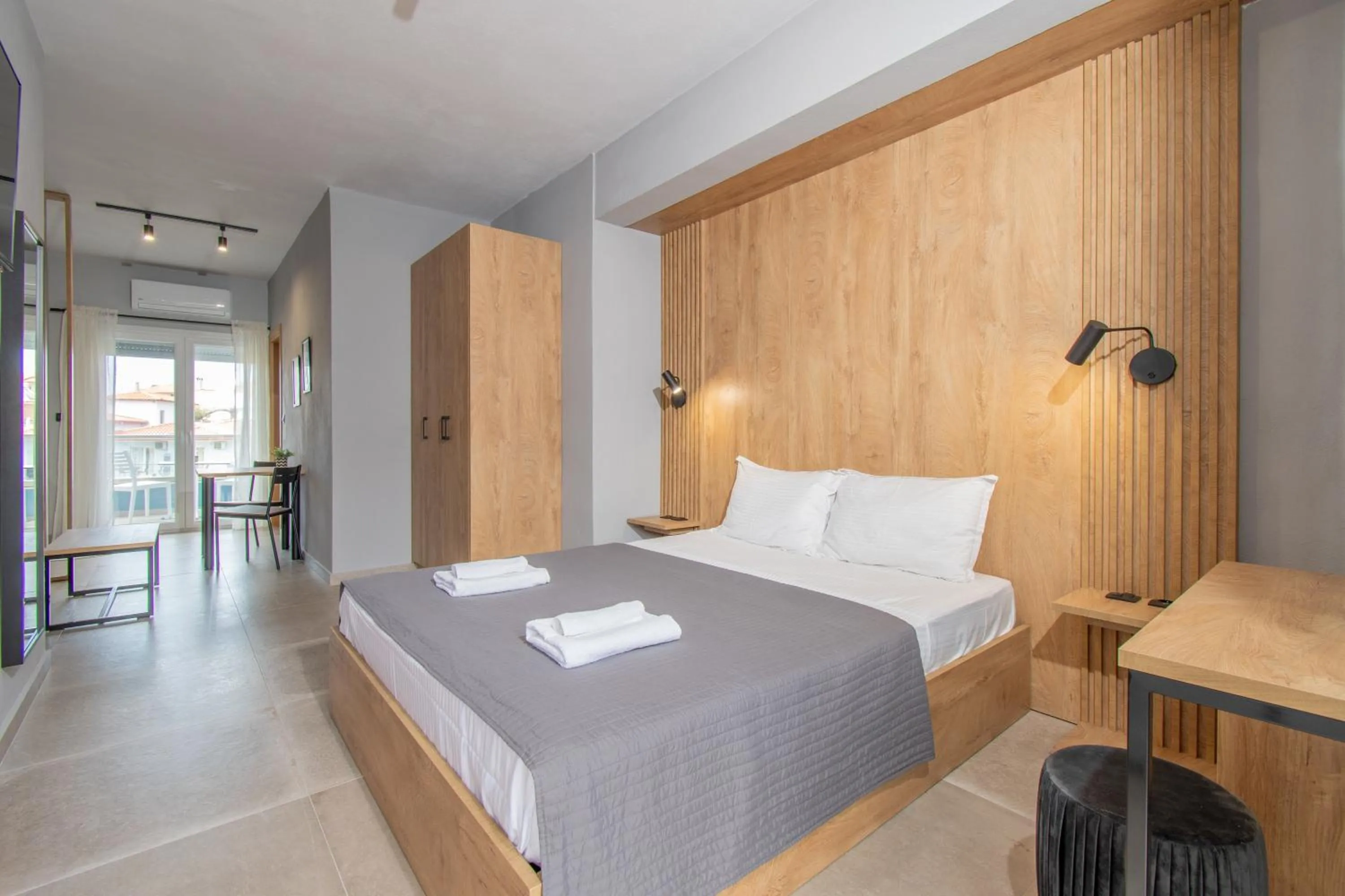 Photo of the whole room, Bed in Unique Aura Luxury Studios