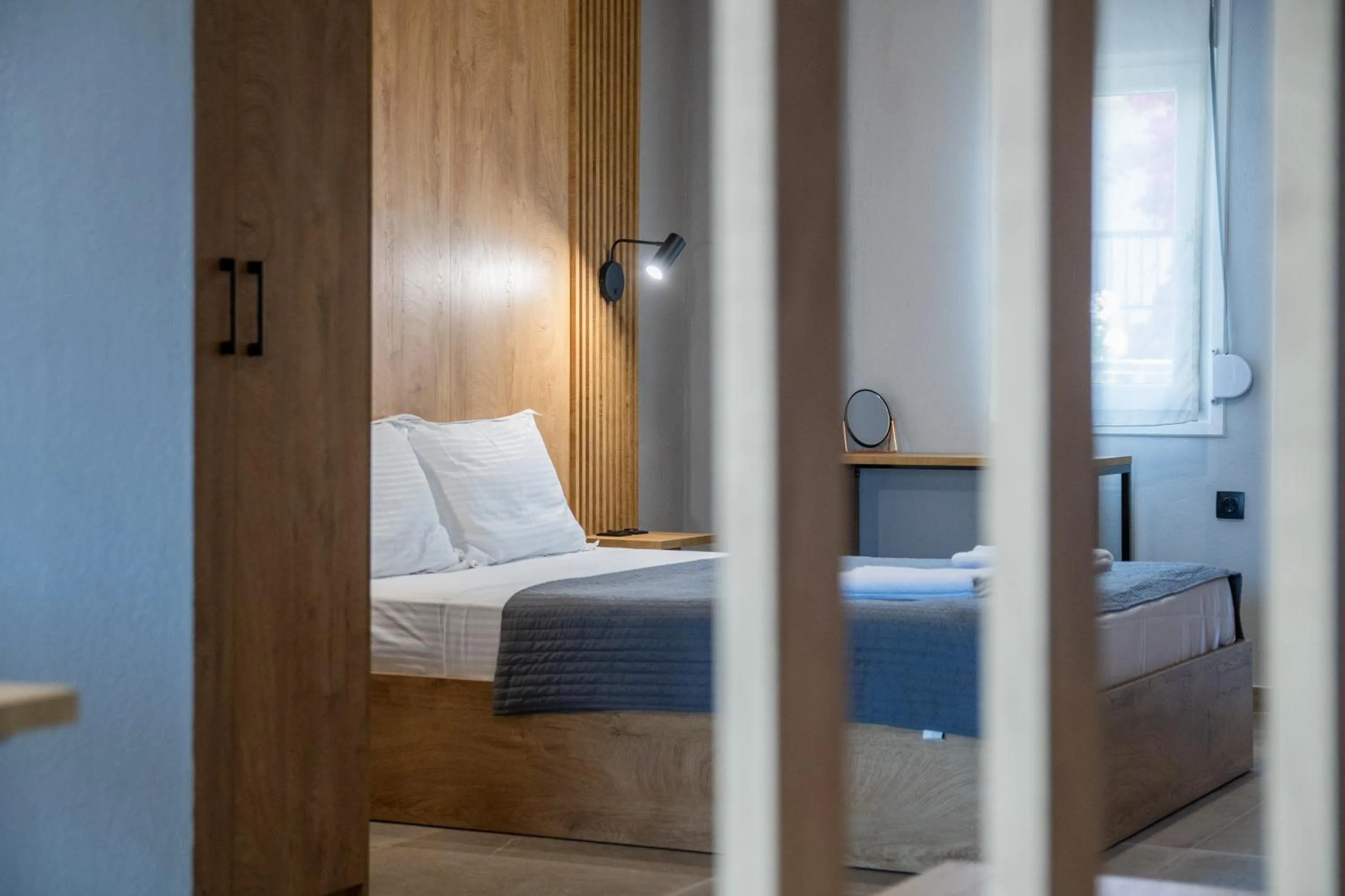 Bed in Unique Aura Luxury Studios