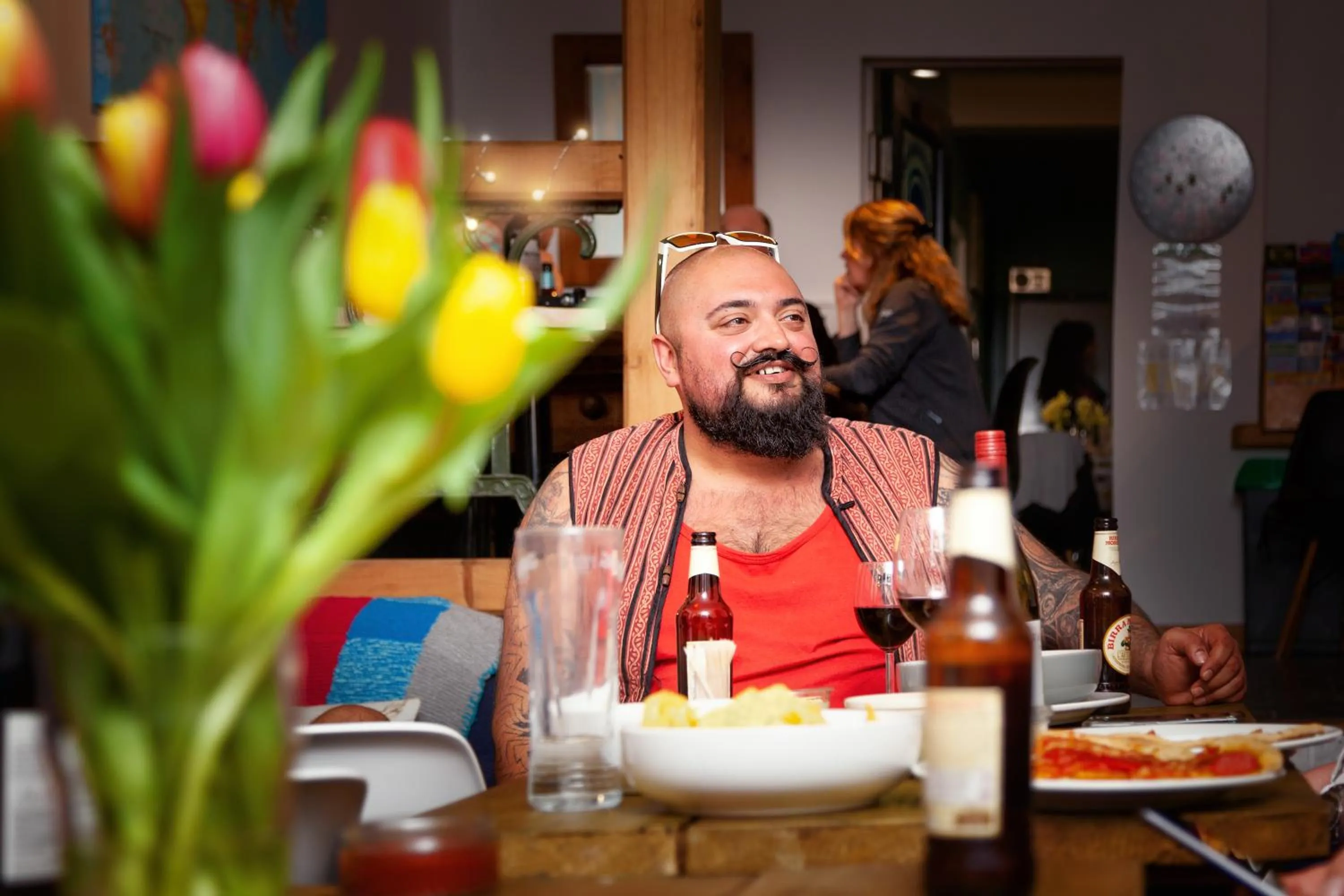 Communal lounge/ TV room in Ocean Backpackers self-catering hostel