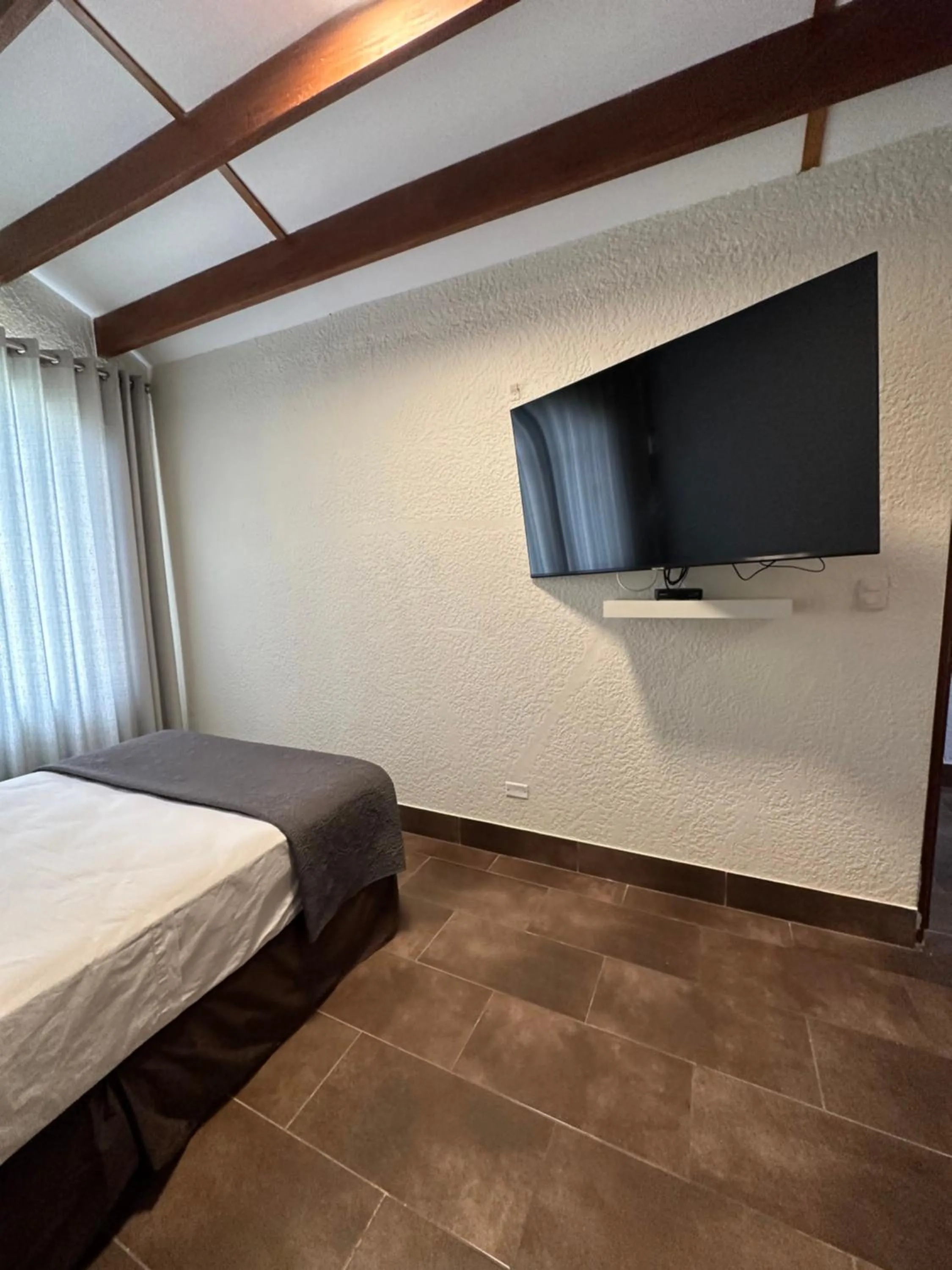 TV and multimedia, Bed in VPX Hoteles Cieneguilla
