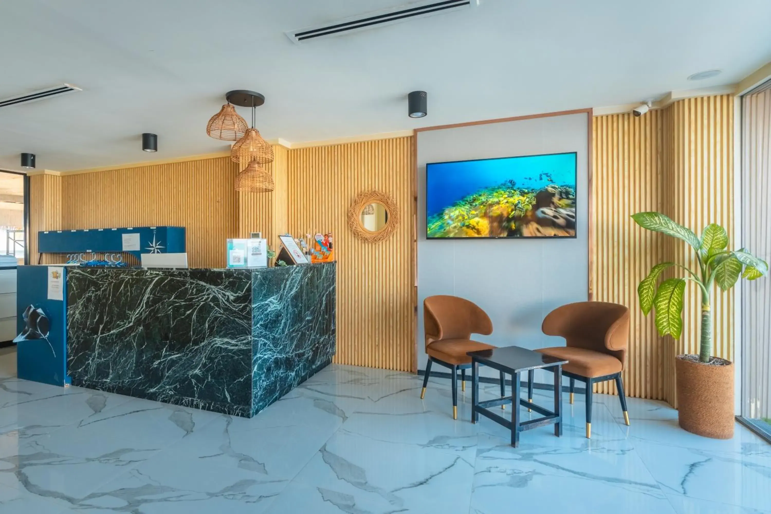 Lobby or reception in Swarn by Hawks Hotels Kamadhoo Baa Atoll Lobby or reception in Swarn by Hawks Hotels Kamadhoo Baa Atoll