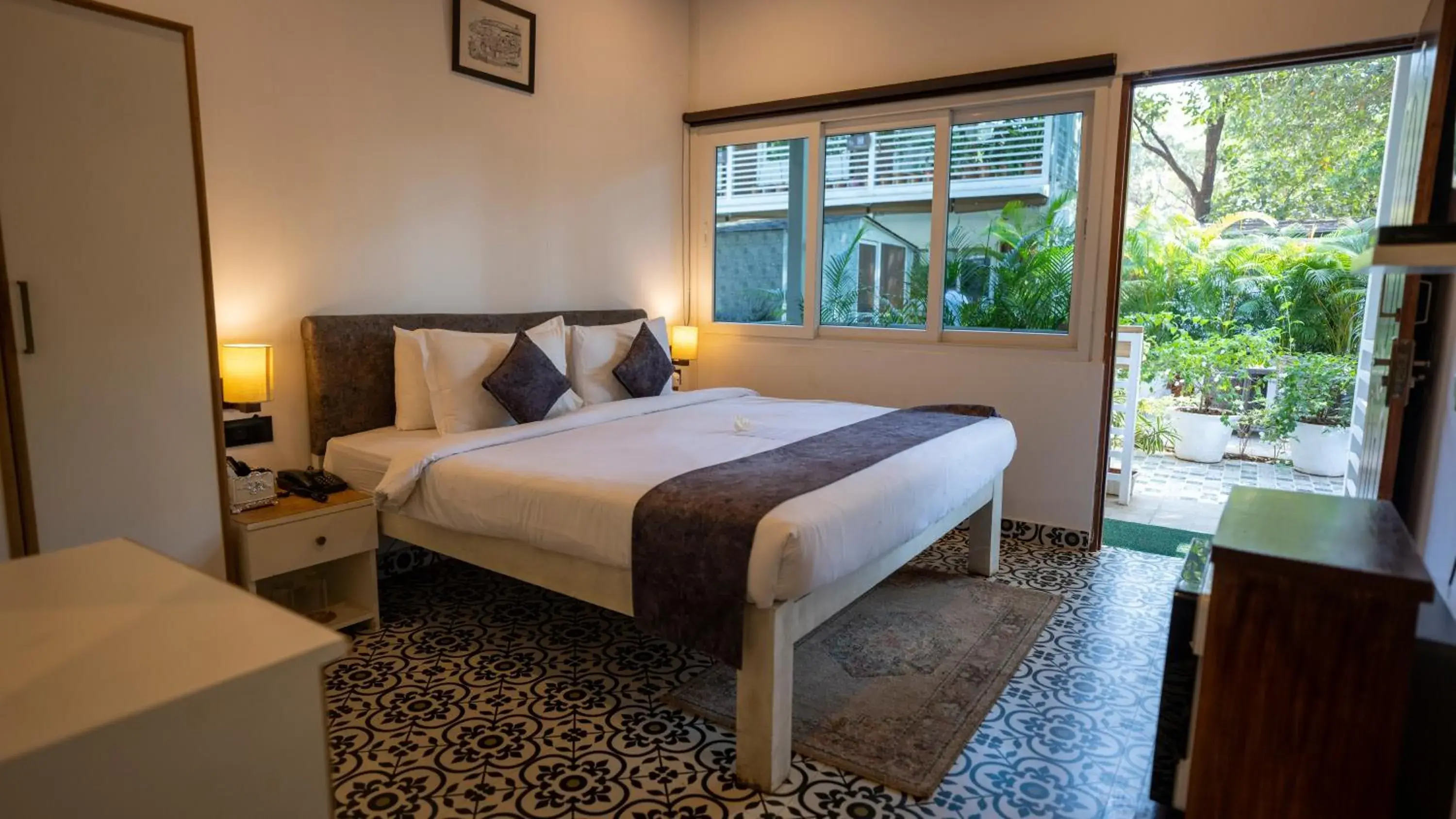 Deluxe Room with Pool View in Whiteflower Cottages Vagator Deluxe Room with Pool View in Whiteflower Cottages Vagator