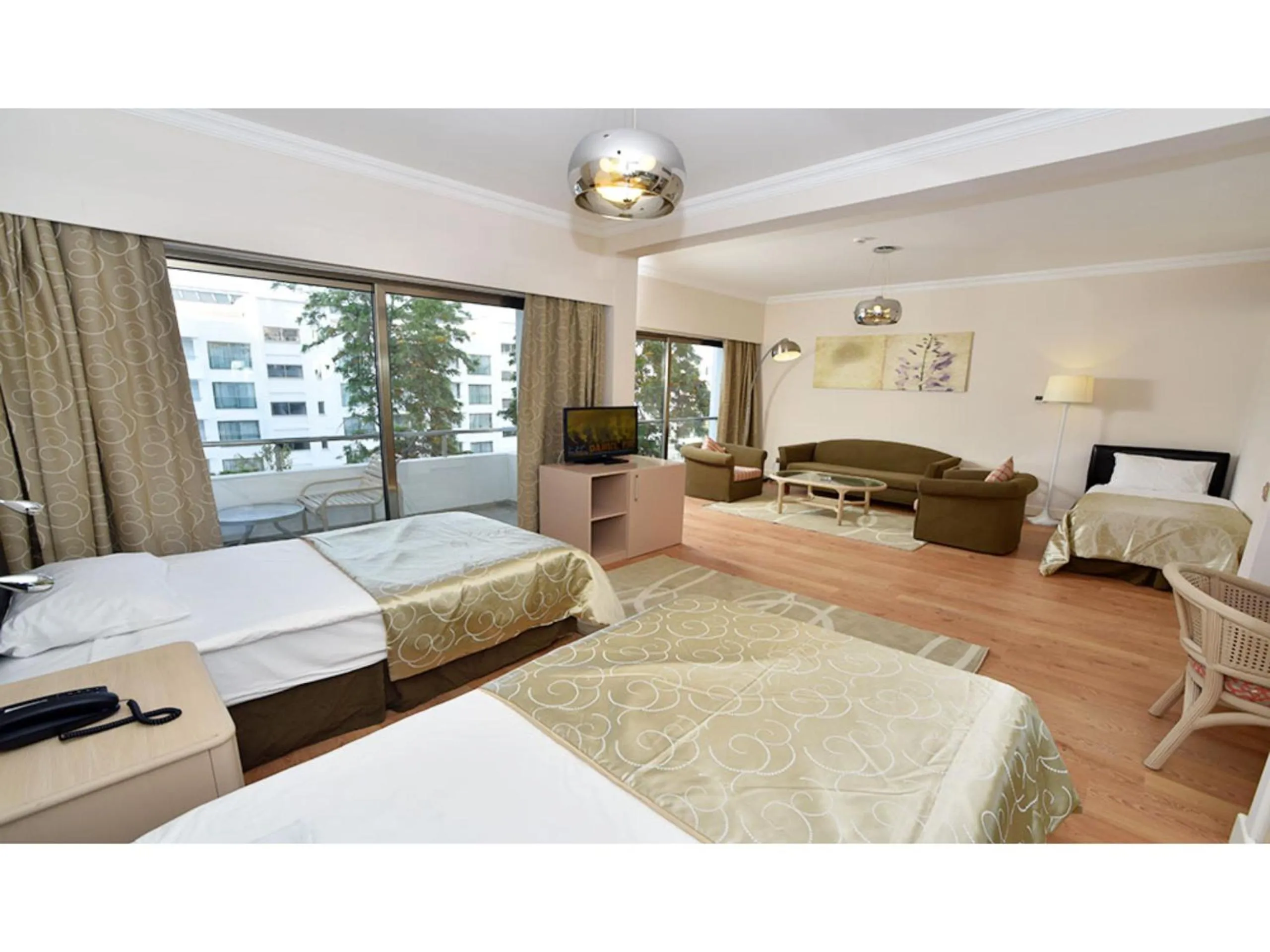 Living room, Bed in Jasmine Court Hotel & Casino