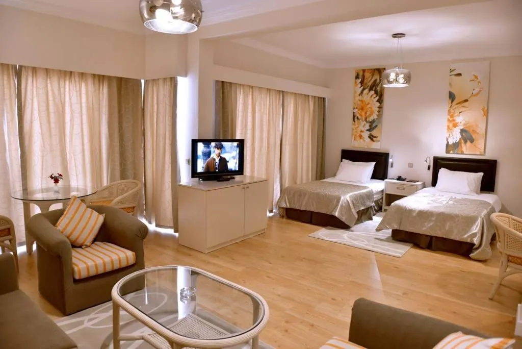 Living room, Bed in Jasmine Court Hotel & Casino