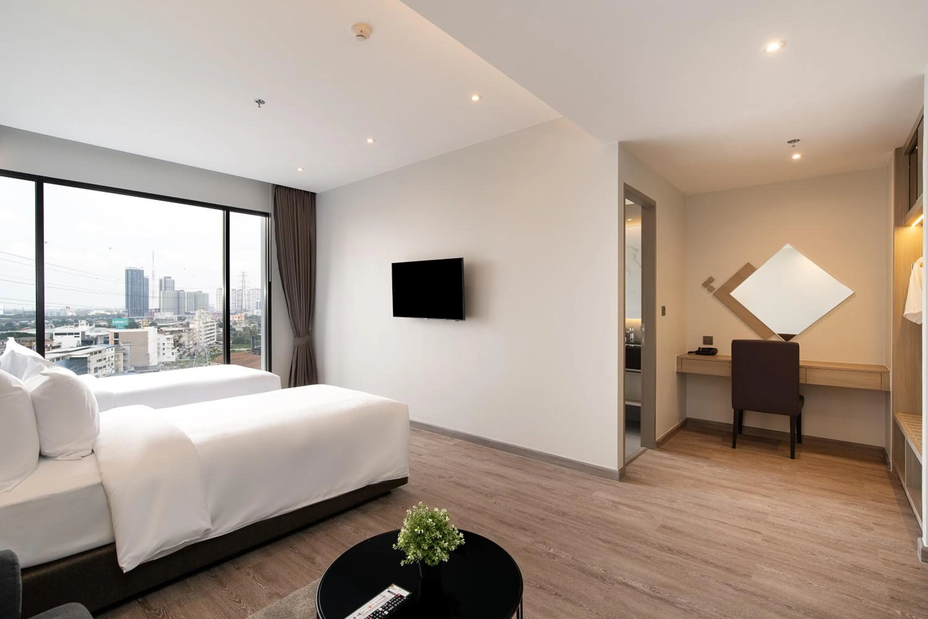 TV and multimedia, Bed in Thaya Hotel Bangkok