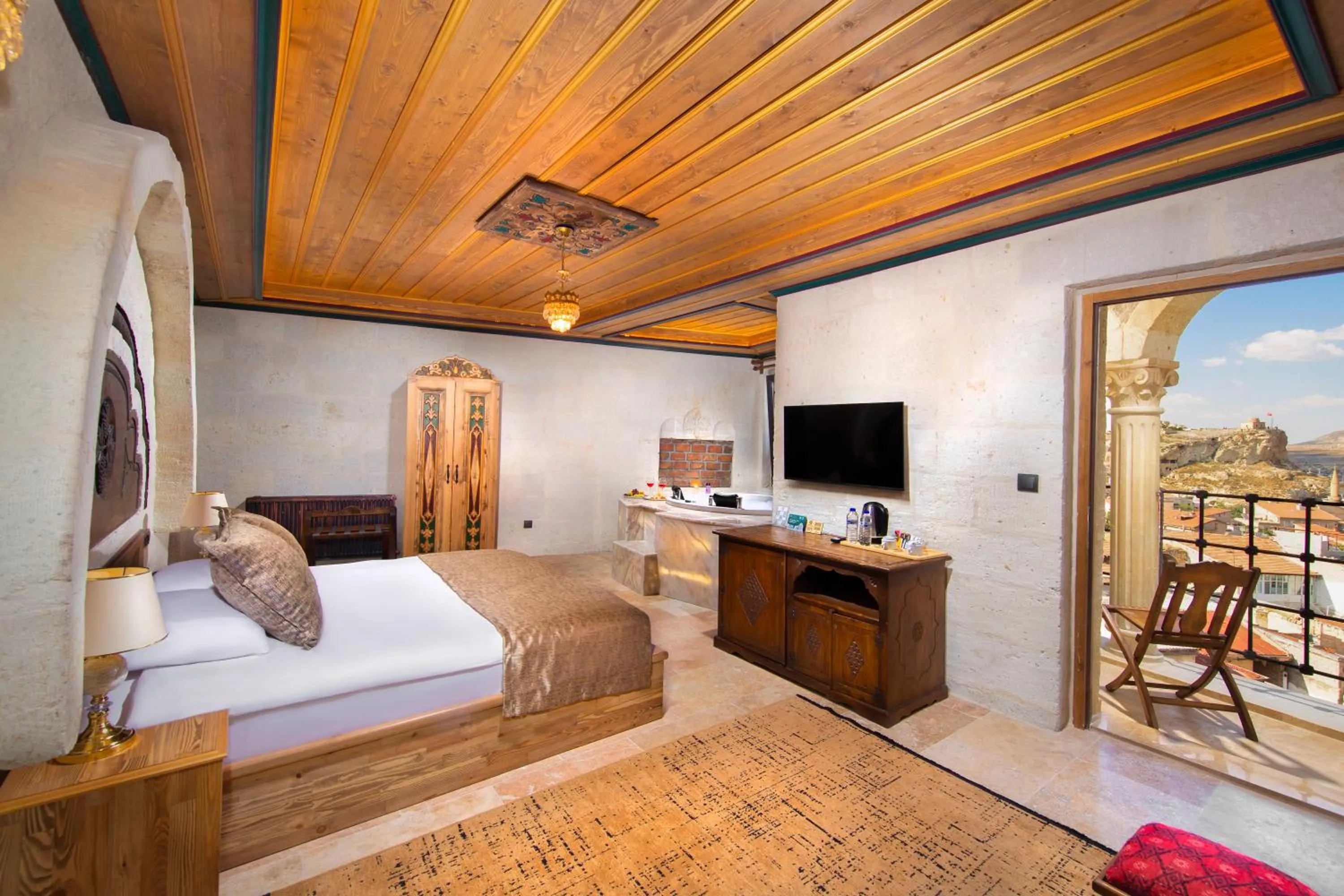 Bed in Dionysos Cave Cappadocia Hotel