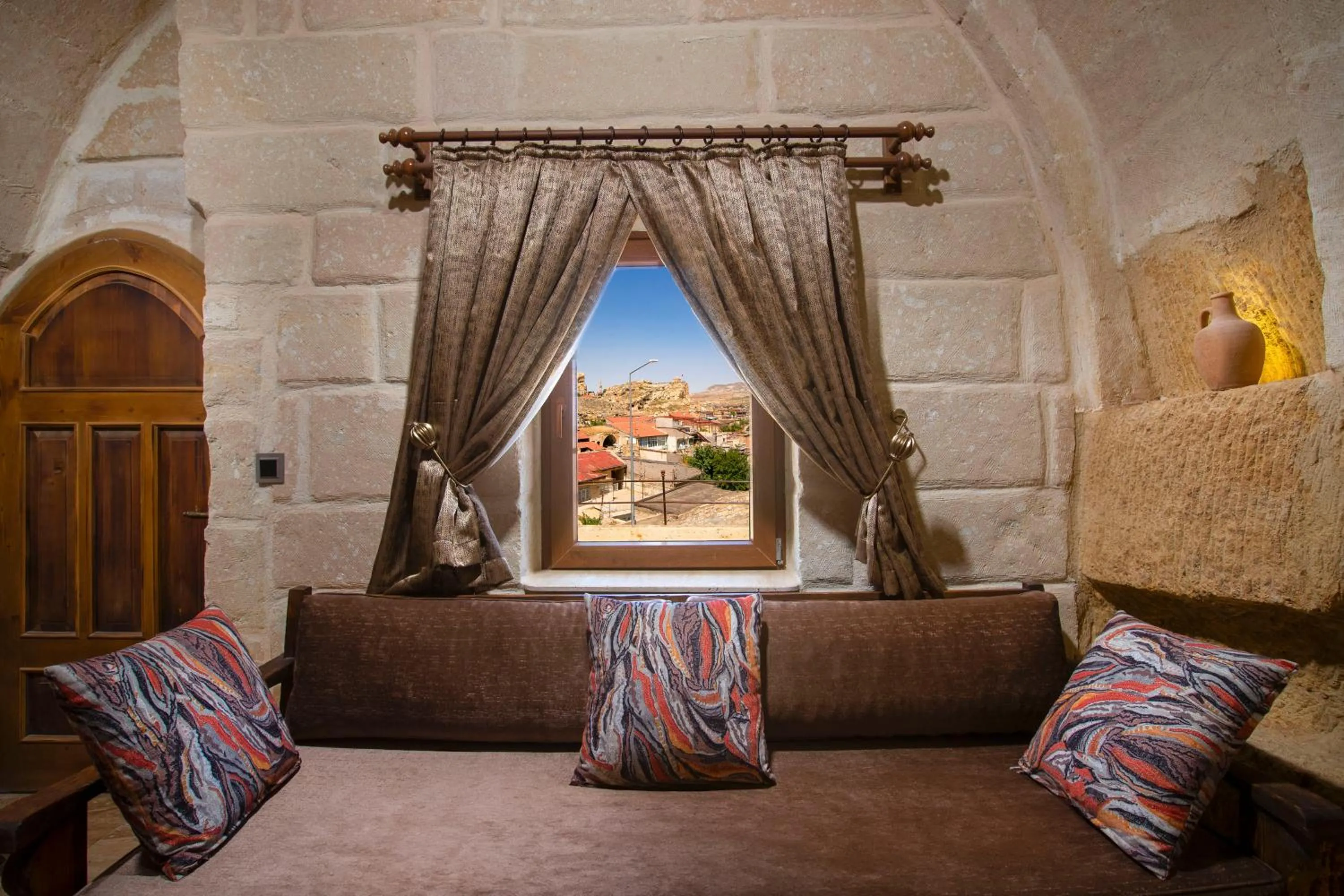 Seating area in Dionysos Cave Cappadocia Hotel