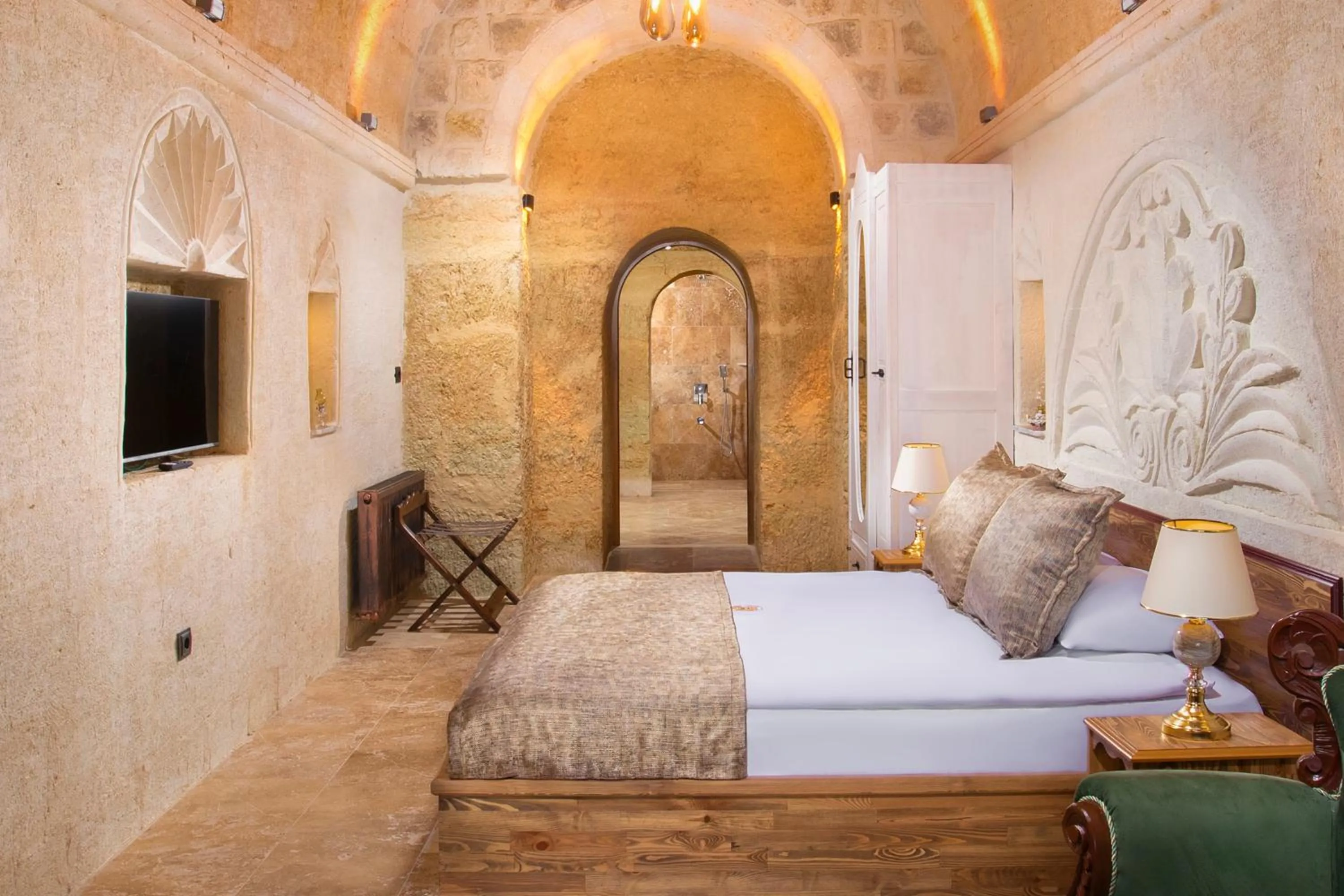 Bed in Dionysos Cave Cappadocia Hotel