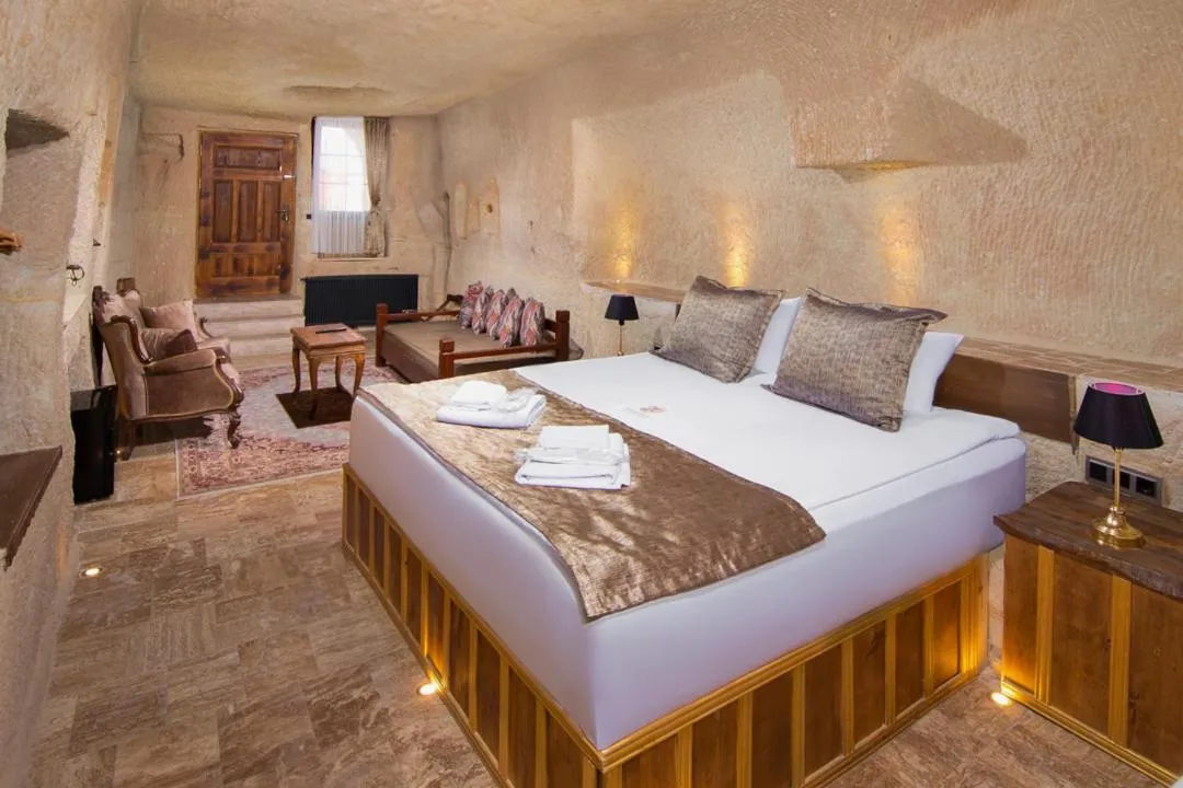 Bed in Dionysos Cave Cappadocia Hotel