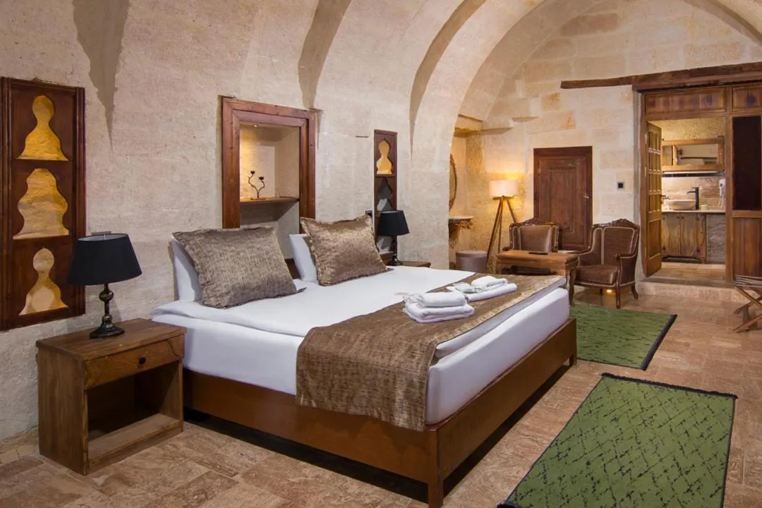 Bed in Dionysos Cave Cappadocia Hotel