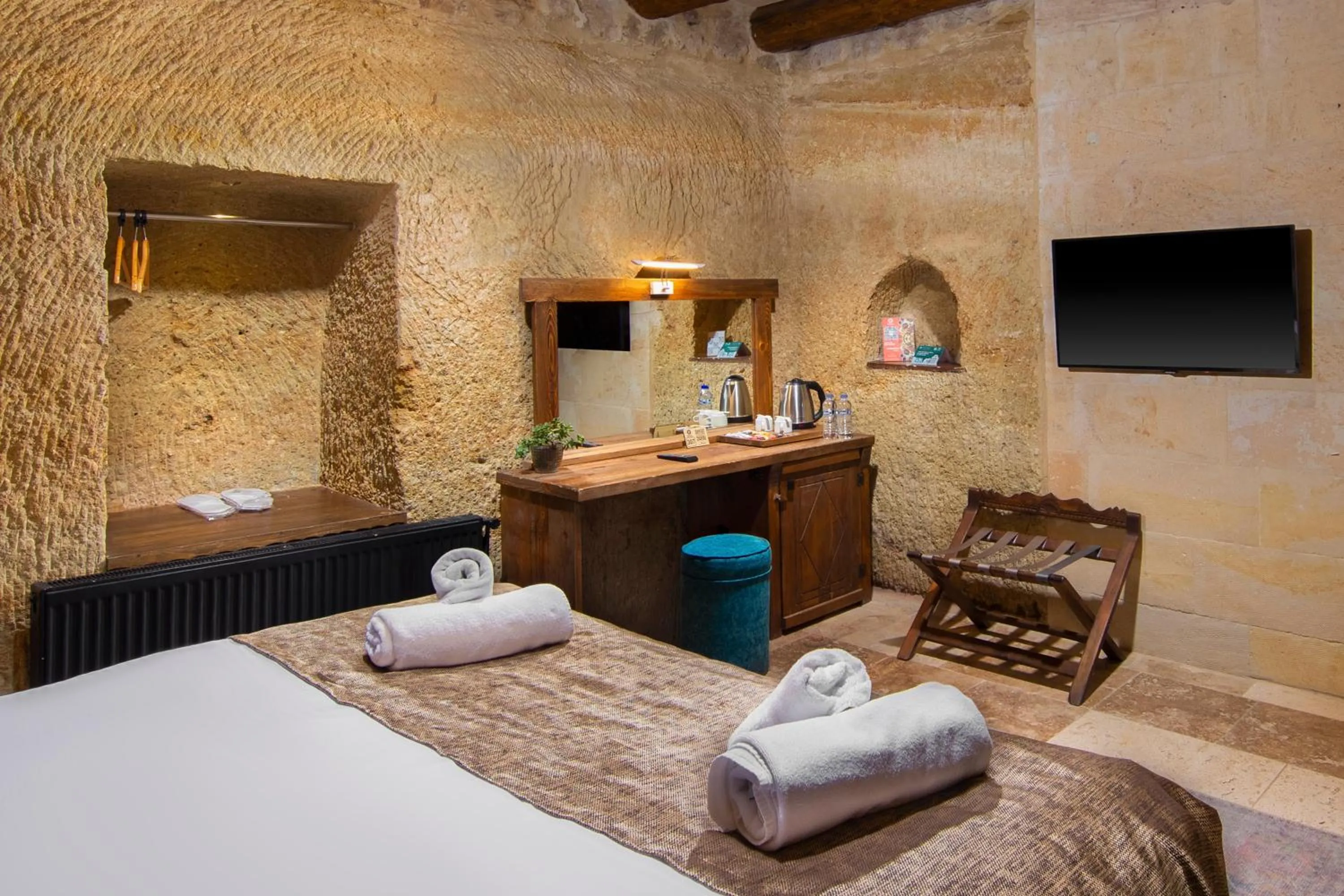 Bed in Dionysos Cave Cappadocia Hotel