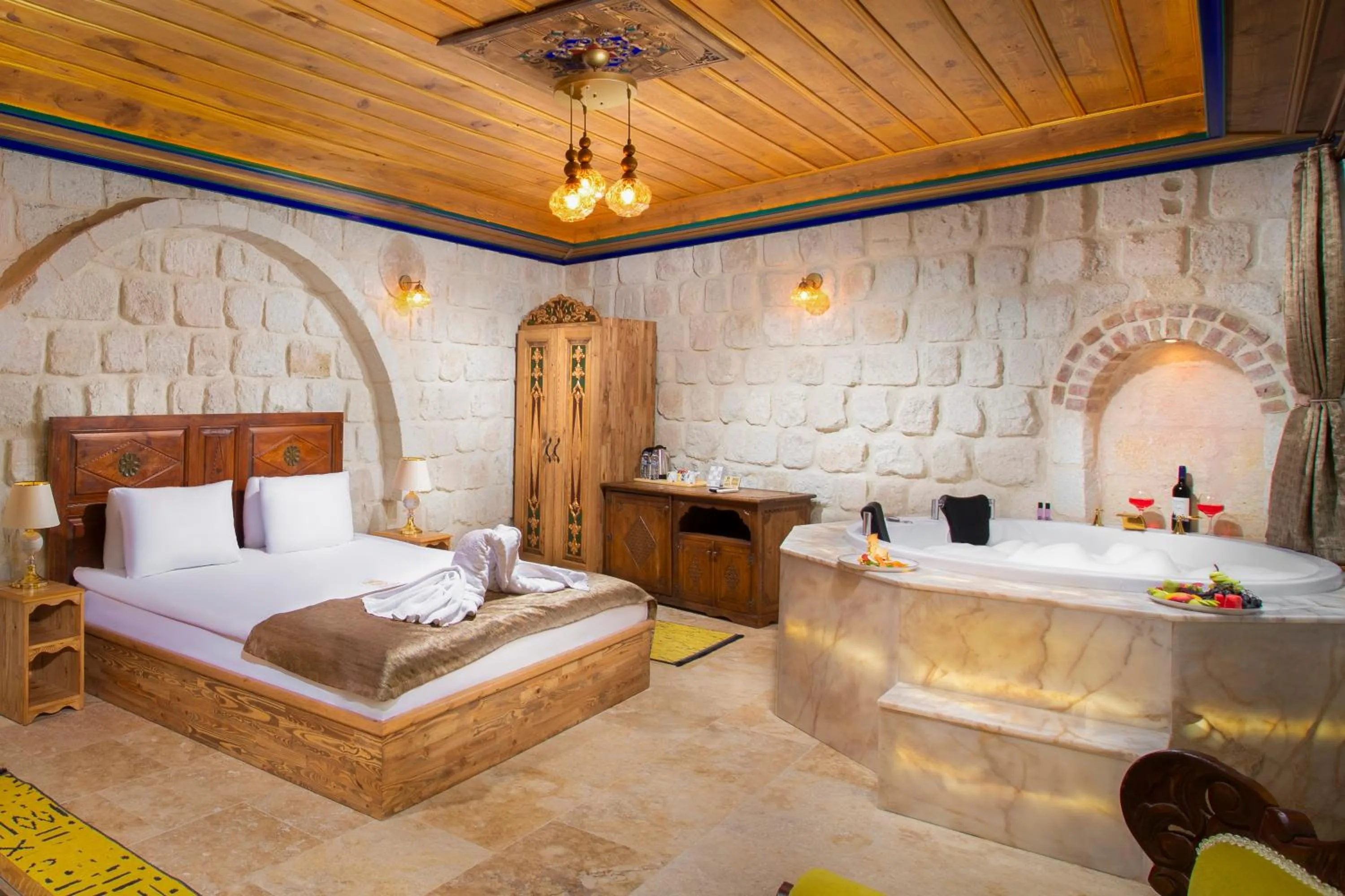Bed in Dionysos Cave Cappadocia Hotel